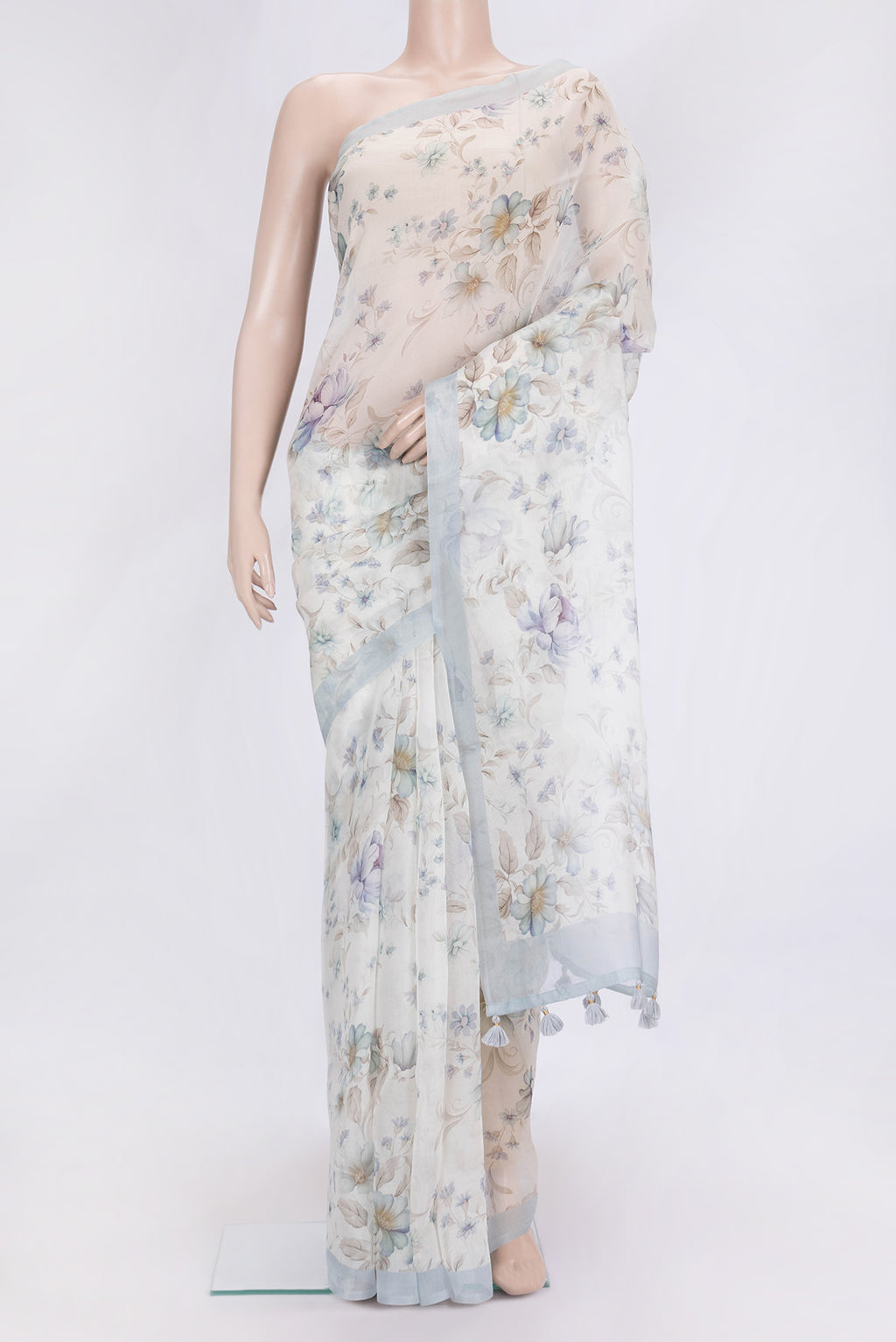 Beige Dual Tone Organza Silk Saree with Printed design on the body and Plain Border.  displayed on a mannequin