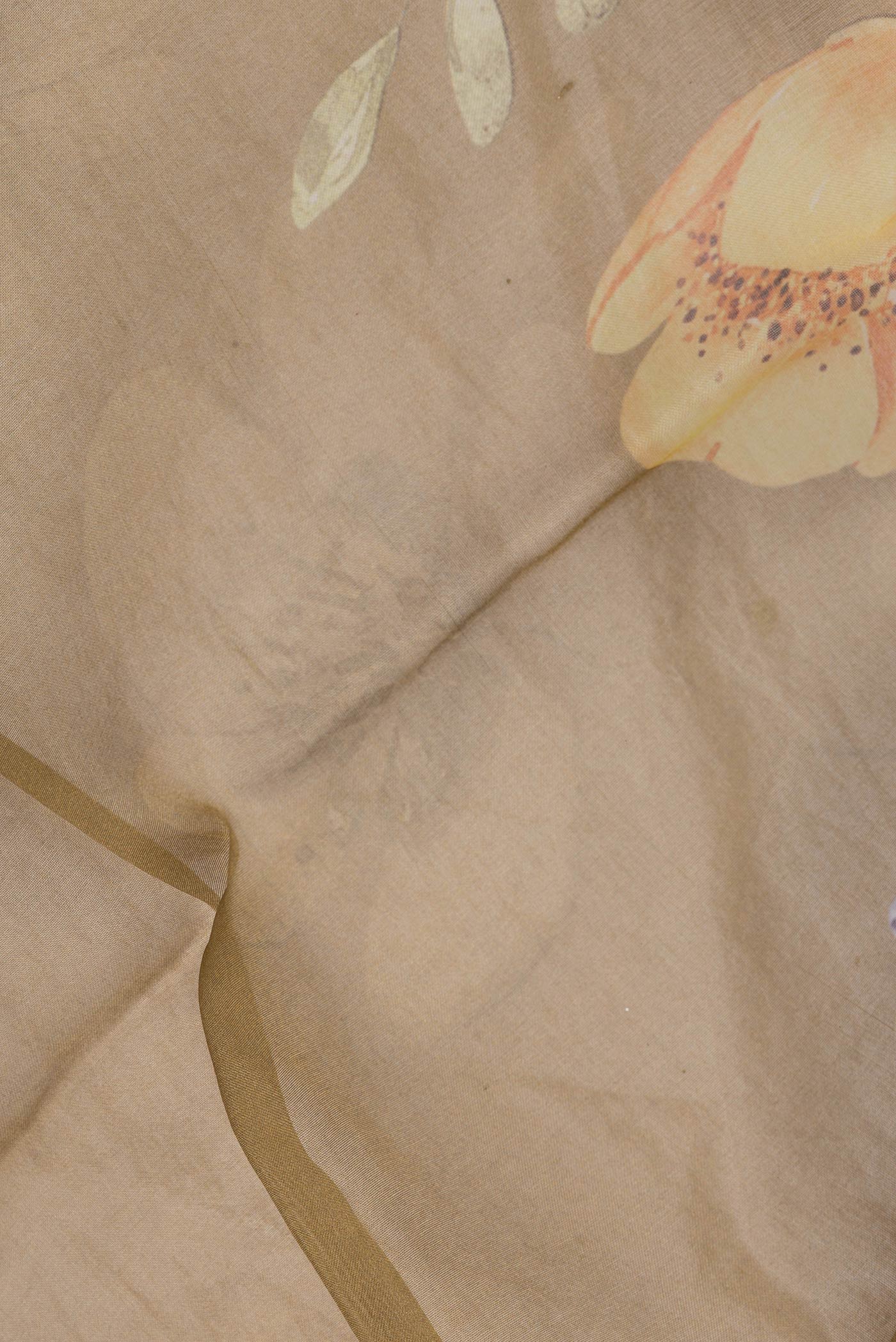Close up of Mehandi Green Dual Tone Organza Silk Saree with Printed design on the body and Without Border.  displaying folds