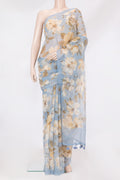 Light Blue Organza Silk Saree with Floral Print on the body and Without Border.  displayed on a mannequin