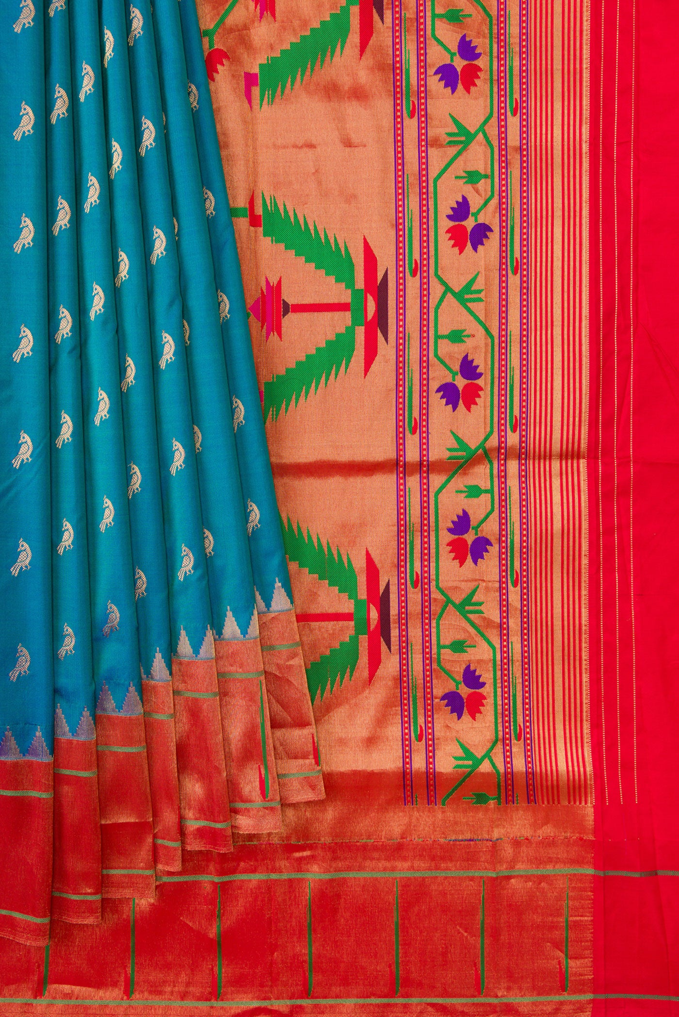 Pleats and pallu of Peacock Blue Dual Tone Paithani Silk Saree with Zari Butta on the body and Paithani Border. 