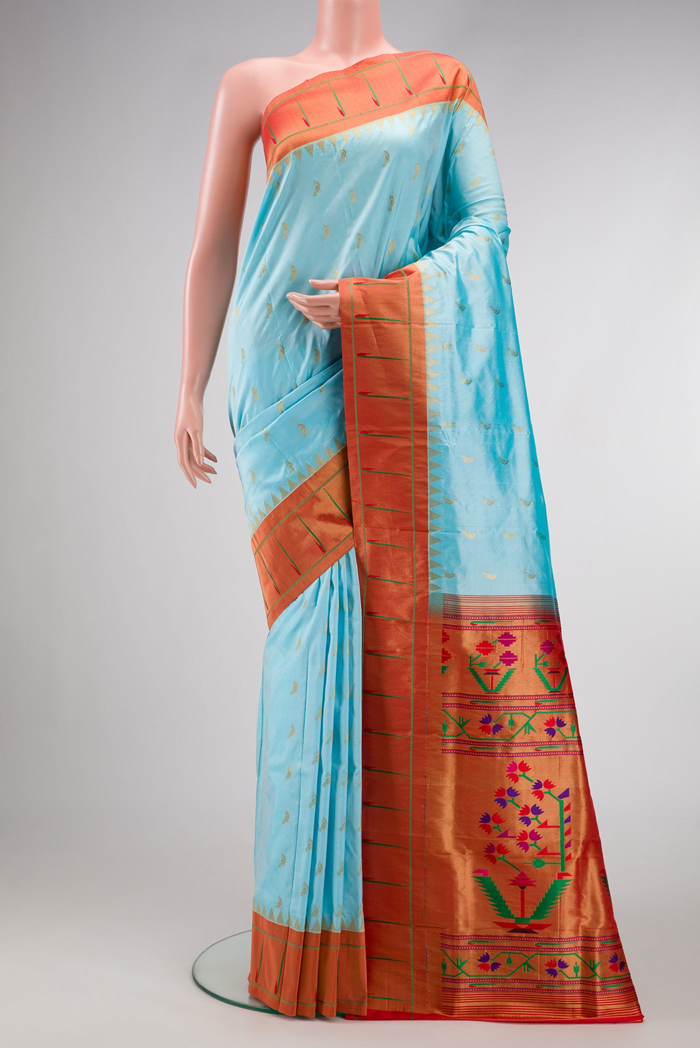 Sky Blue Dual Tone Paithani Silk Saree with Zari Butta on the body and Paithani Border.  displayed on a mannequin