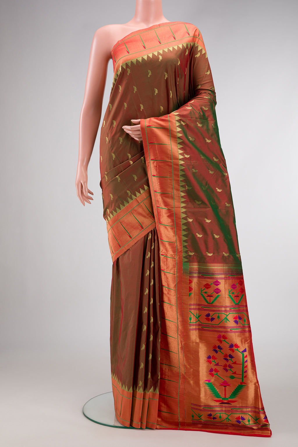 Mehandi Green Dual Tone Paithani Silk Saree with Zari Butta on the body and Paithani Border.  displayed on a mannequin