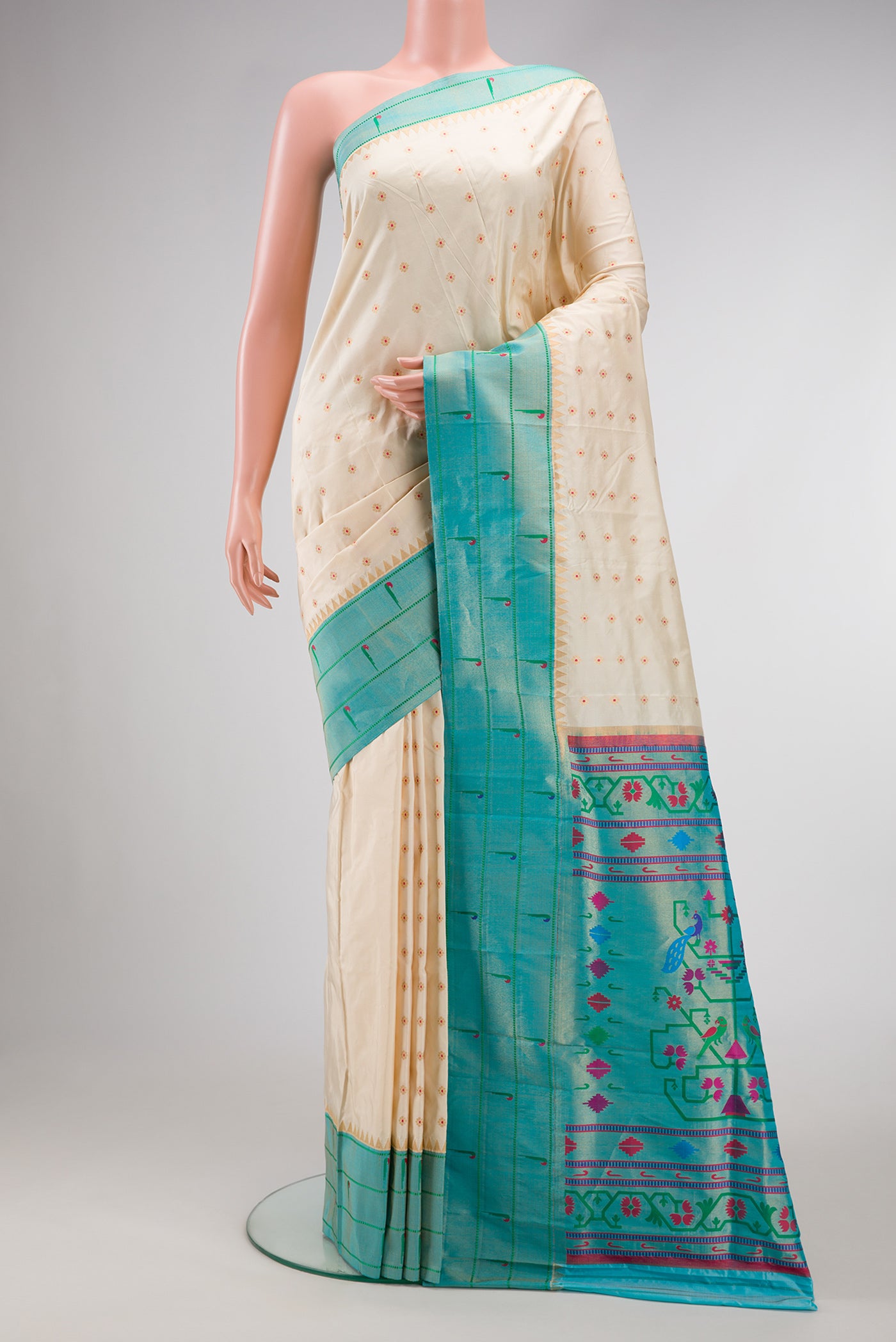 Beige Dual Tone Paithani Silk Saree with Zari Butta on the body and Paithani Border.  displayed on a mannequin