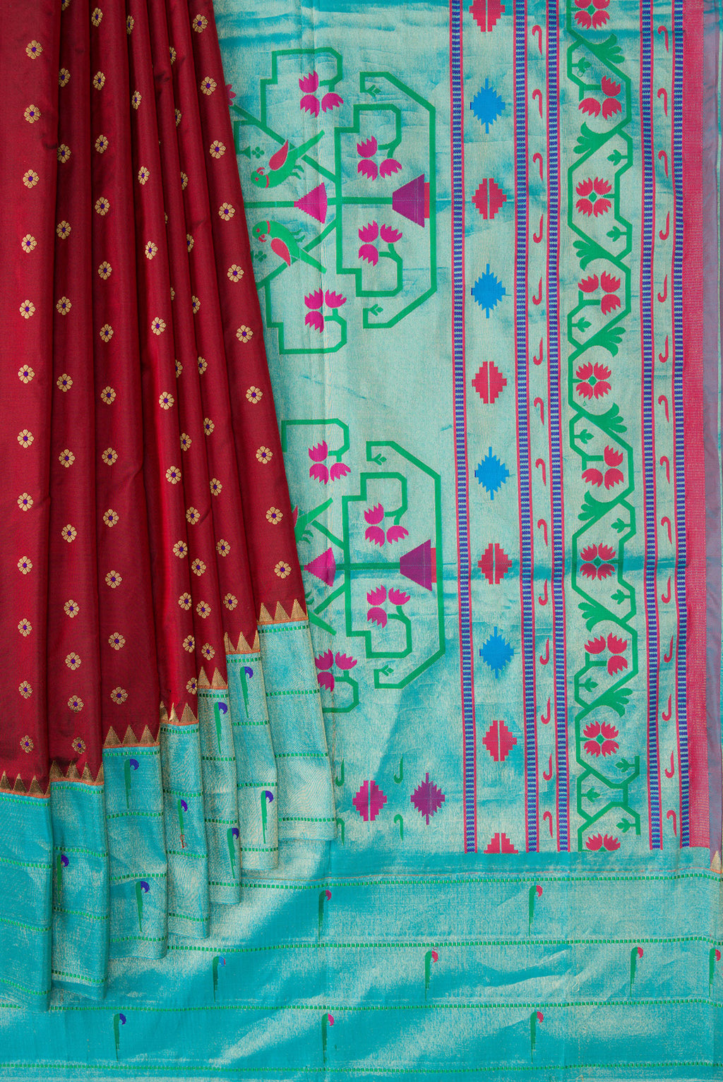 Pleats and pallu of Maroon Dual Tone Paithani Silk Saree with Zari Butta on the body and Paithani Border. 