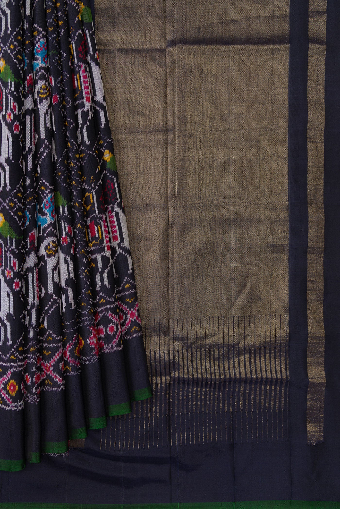 Pleats and pallu of Navy Blue Dual Tone Double Ikat Saree with Ikat Print on the body and Plain Border. 