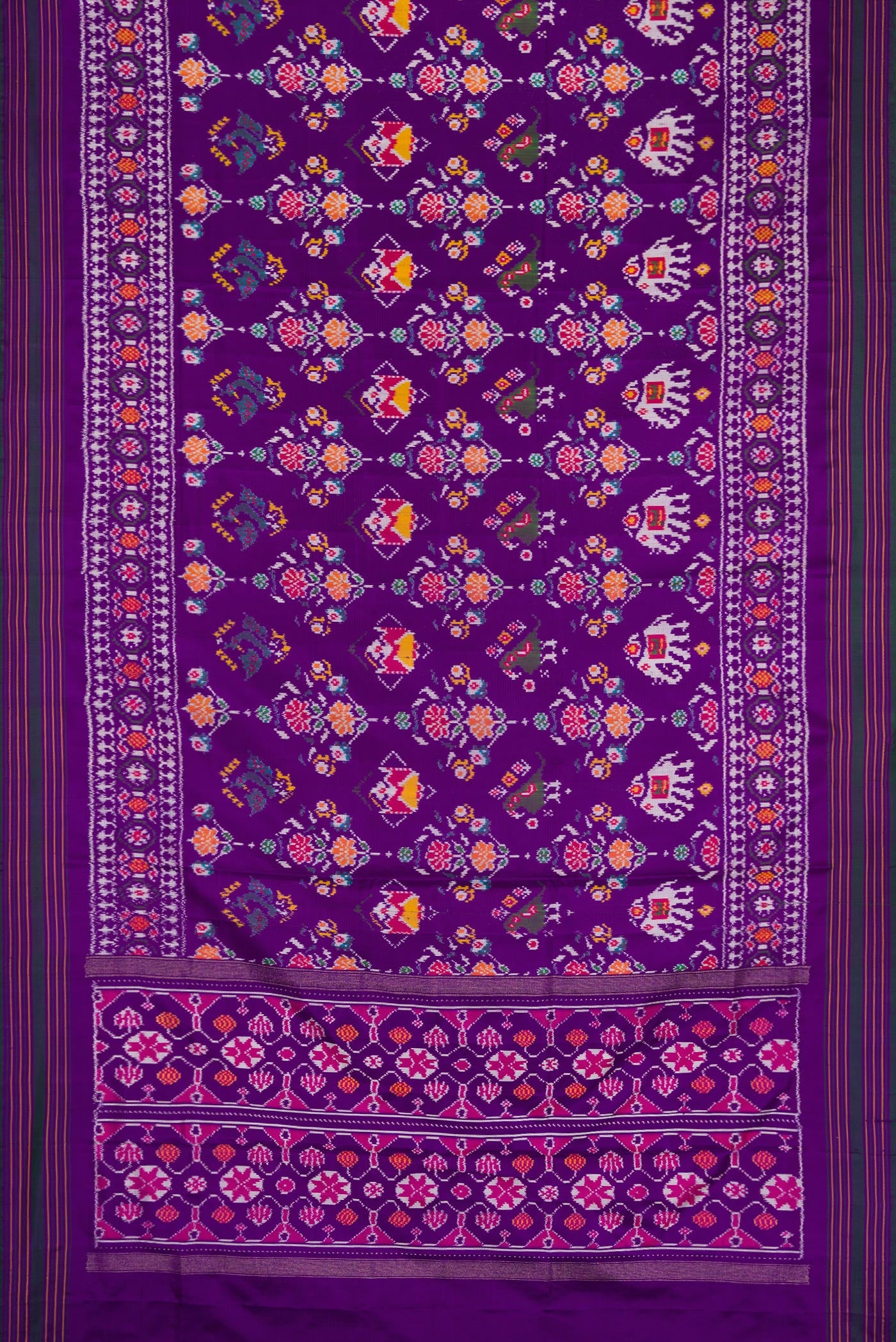 Flat view of Violet Dual Tone Double Ikat Saree with Ikat Print on the body and Ikat Border. 