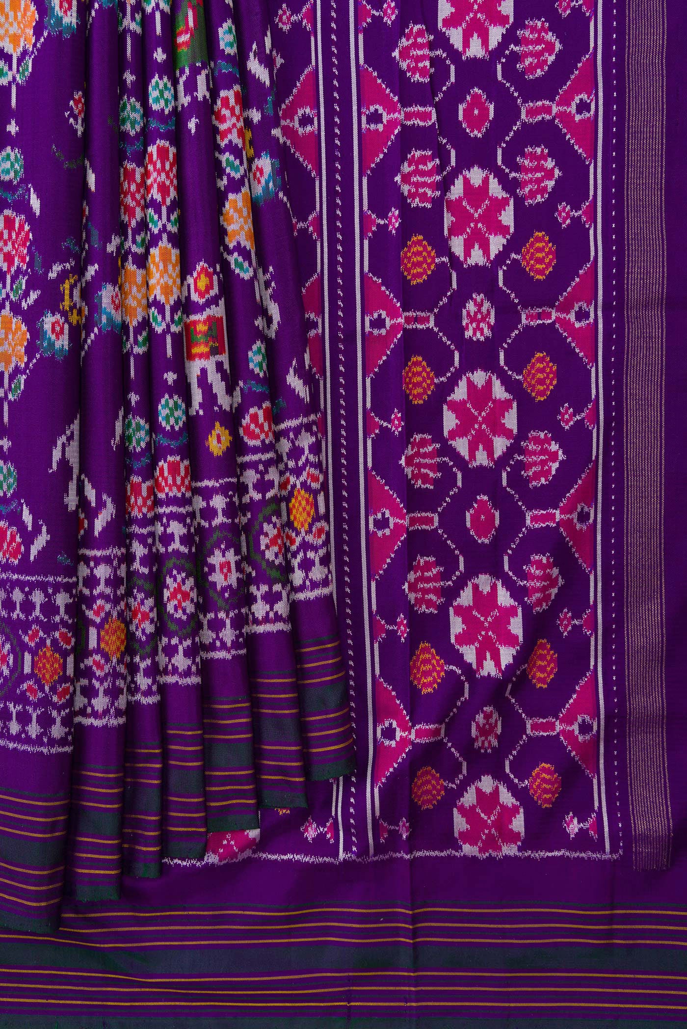 Pleats and pallu of Violet Dual Tone Double Ikat Saree with Ikat Print on the body and Ikat Border. 