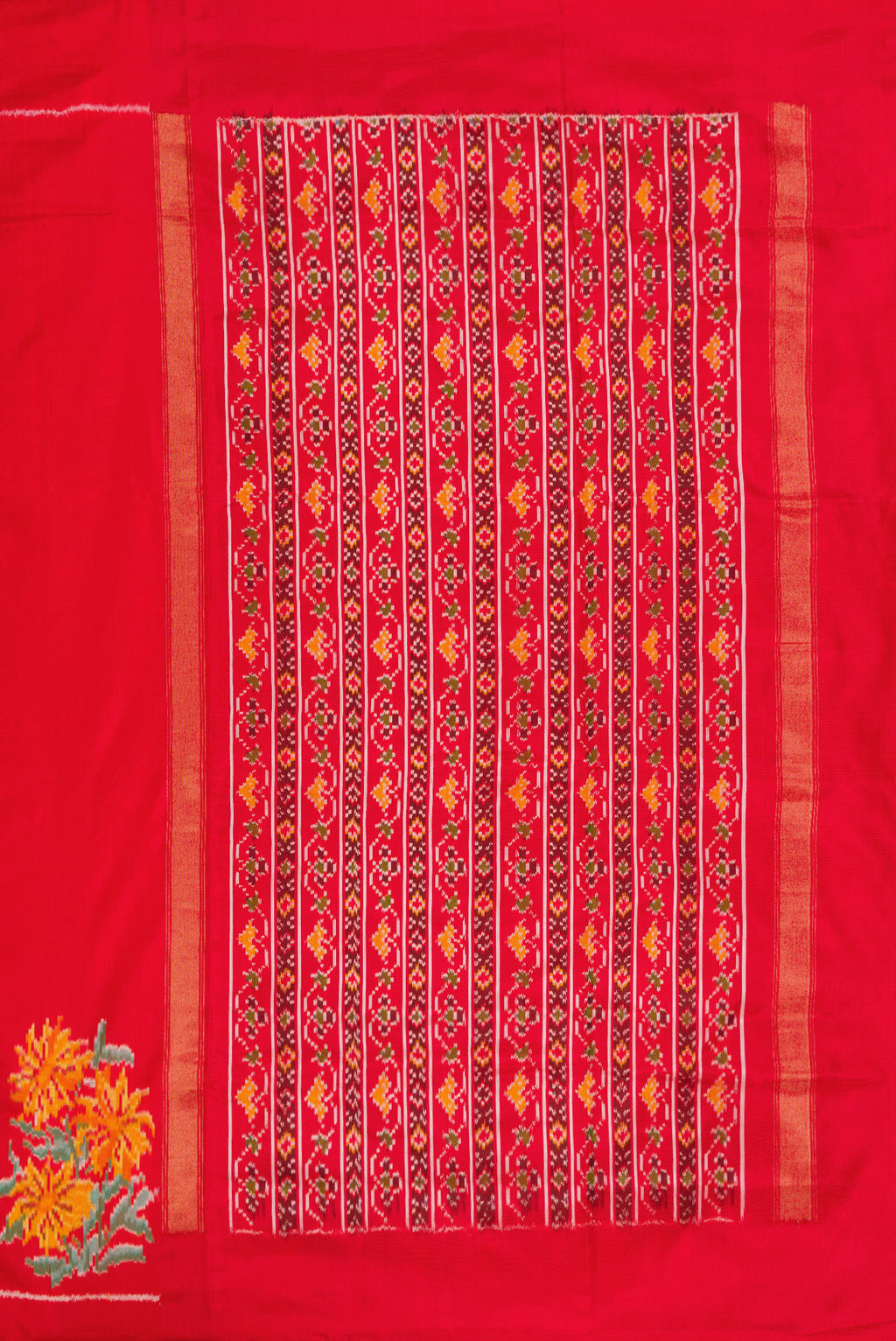 Close up image of the pallu of Red Dual Tone Double Ikat Saree with Plain Body and Ikat Border. 
