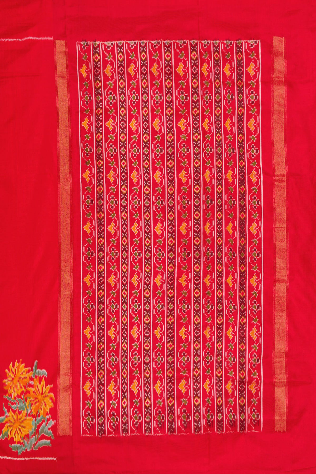 Close up image of the pallu of Red Dual Tone Double Ikat Saree with Plain Body and Ikat Border. 