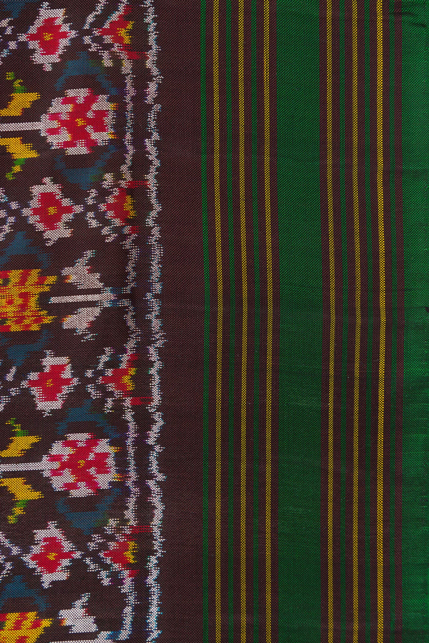 Border image of Black Dual Tone Double Ikat Saree with Ikat Print on the body and Thread Border. 