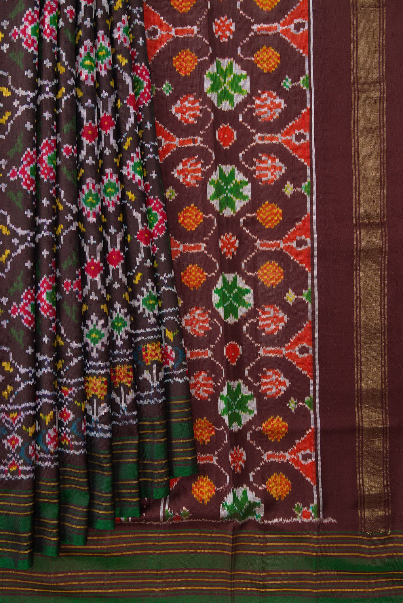 Pleats and pallu of Black Dual Tone Double Ikat Saree with Ikat Print on the body and Thread Border. 