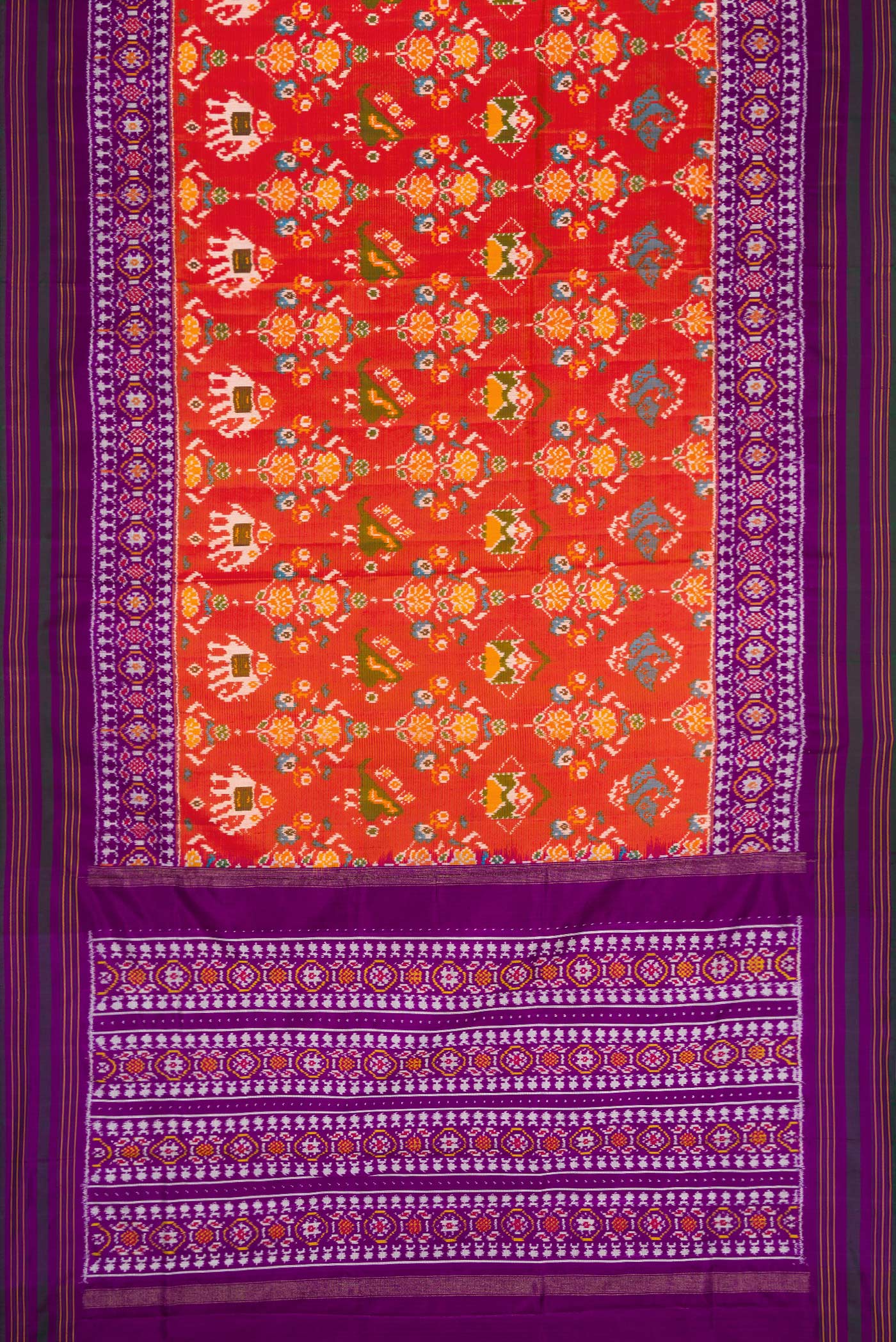 Flat view of Brick Orange Dual Tone Double Ikat Saree with Ikat Print on the body and Zari Border. 