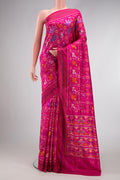 Pink Dual Tone Double Ikat Saree with Ikat Print on the body and Ikat Border.  displayed on a mannequin
