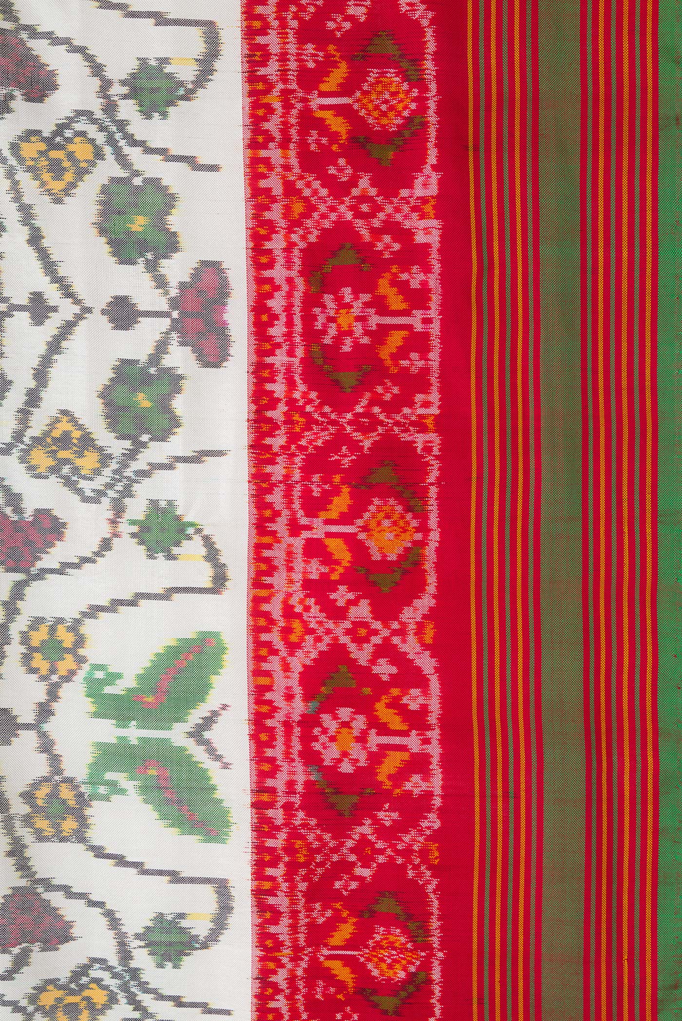 Border image of Off White Dual Tone Double Ikat Saree with Ikat Print on the body and Ikat Border. 