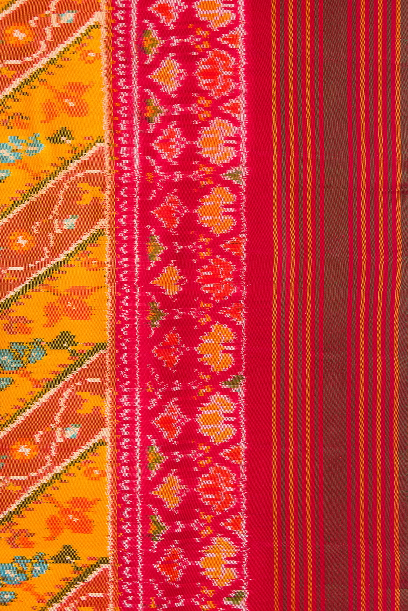 Border image of Mustard Dual Tone Double Ikat Saree with Ikat Print on the body and Ikat Border. 