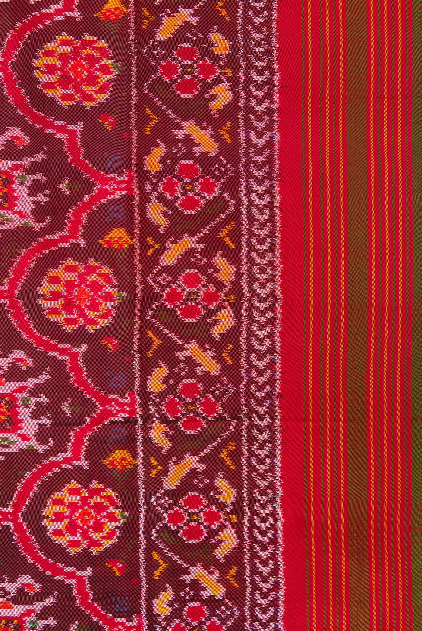 Border image of Maroon Dual Tone Double Ikat Saree with Ikat Print on the body and Zari Border. 