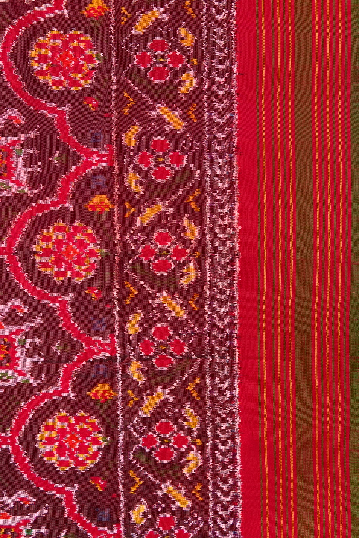 Border image of Maroon Dual Tone Double Ikat Saree with Ikat Print on the body and Zari Border. 