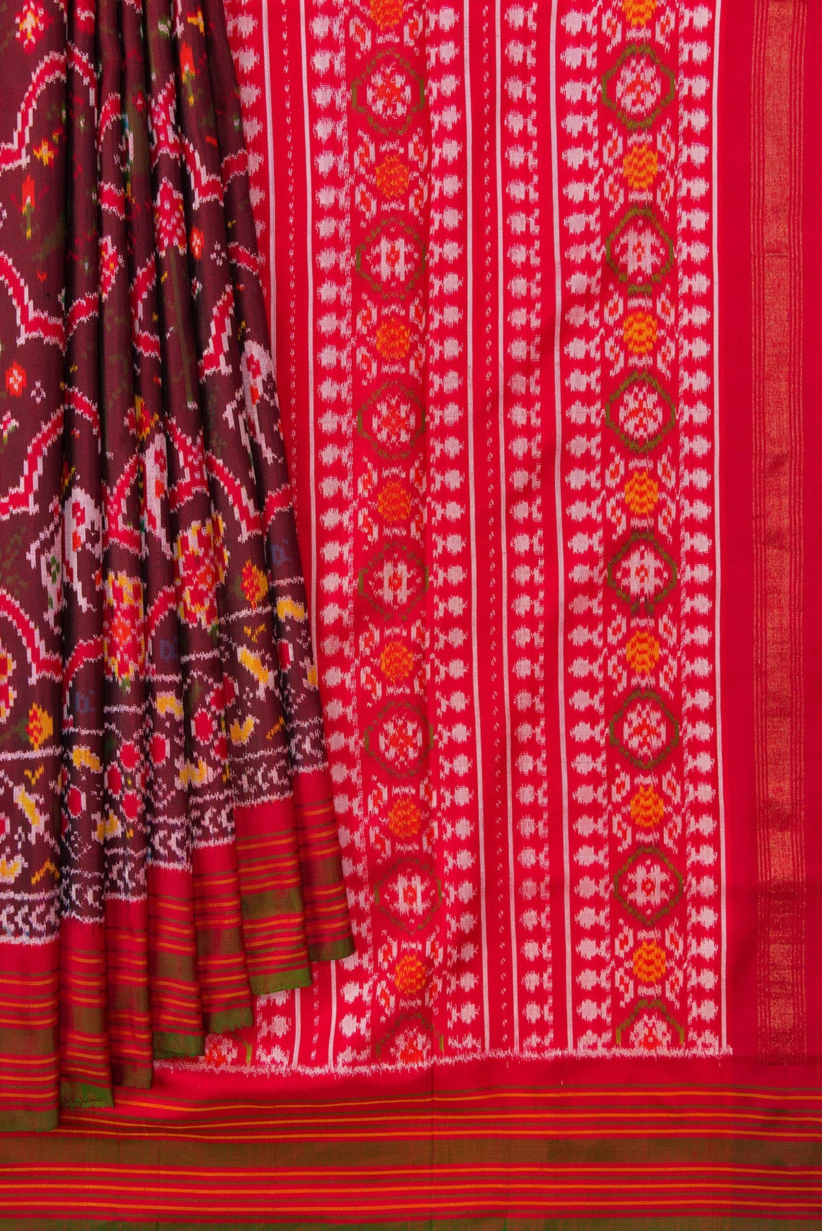 Pleats and pallu of Maroon Dual Tone Double Ikat Saree with Ikat Print on the body and Zari Border. 