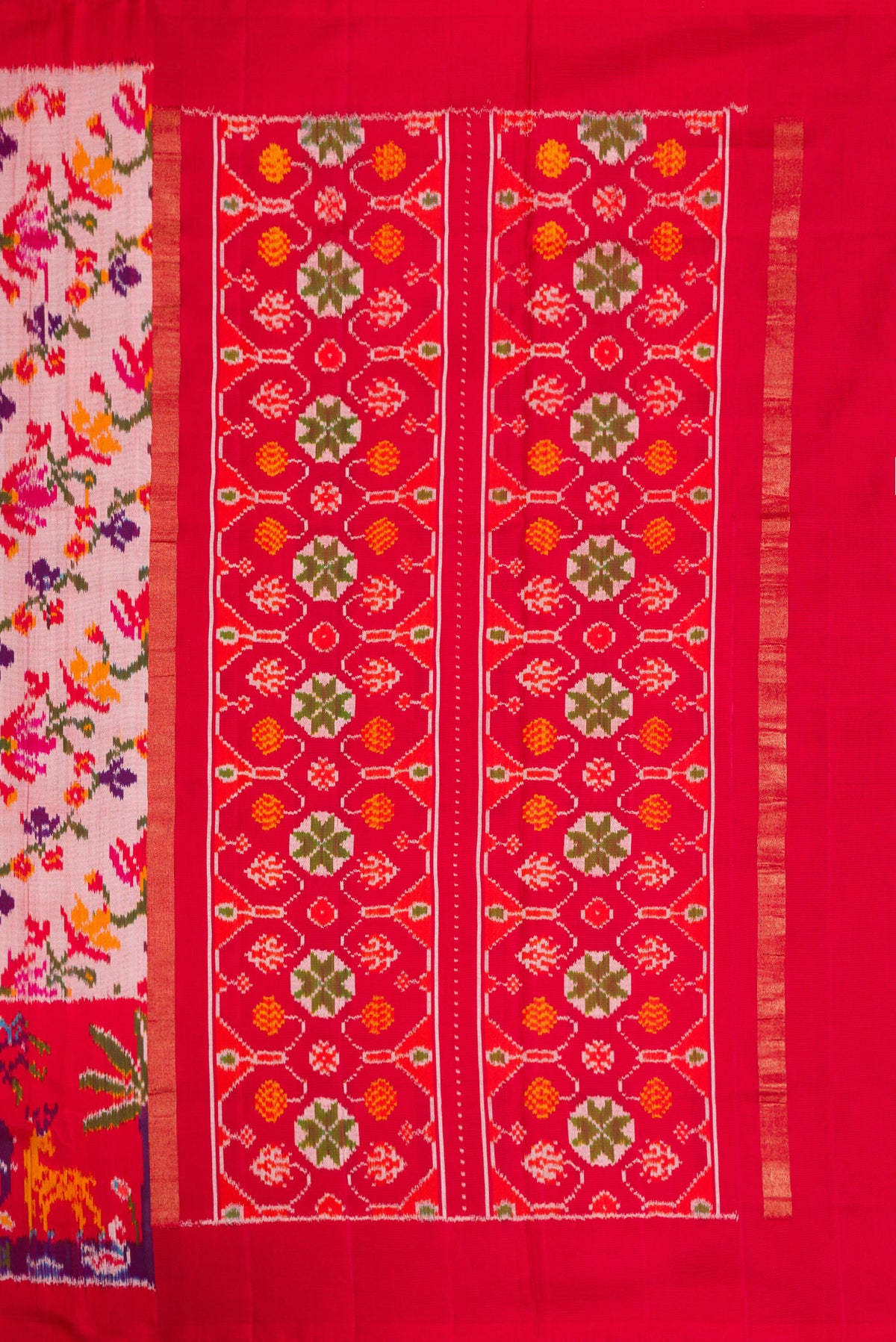 Close up image of the pallu of Pink Dual Tone Double Ikat Saree with Ikat Print on the body and Ikat Border. 