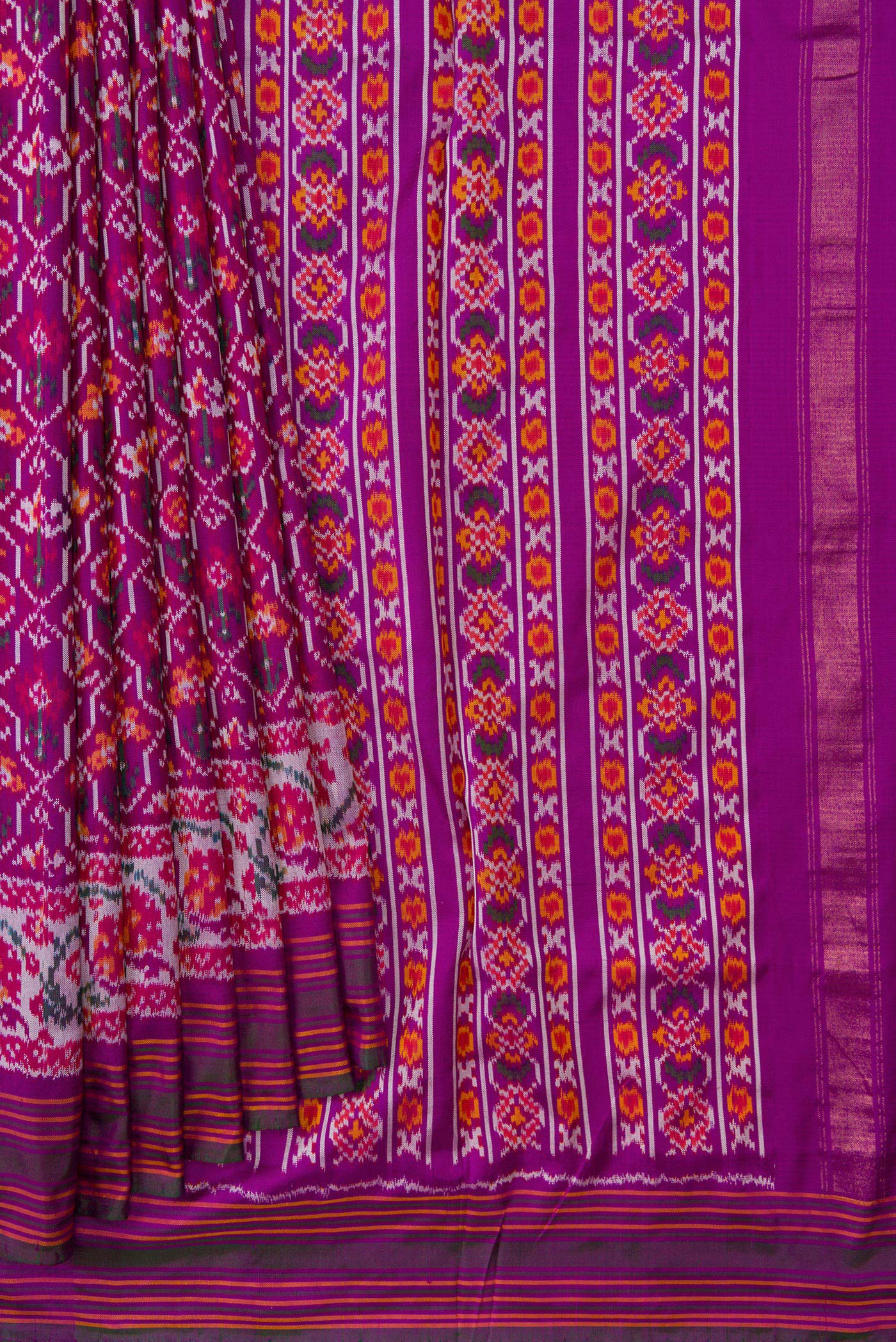 Pleats and pallu of Purple Dual Tone Double Ikat Saree with Ikat Print on the body and Zari Border. 