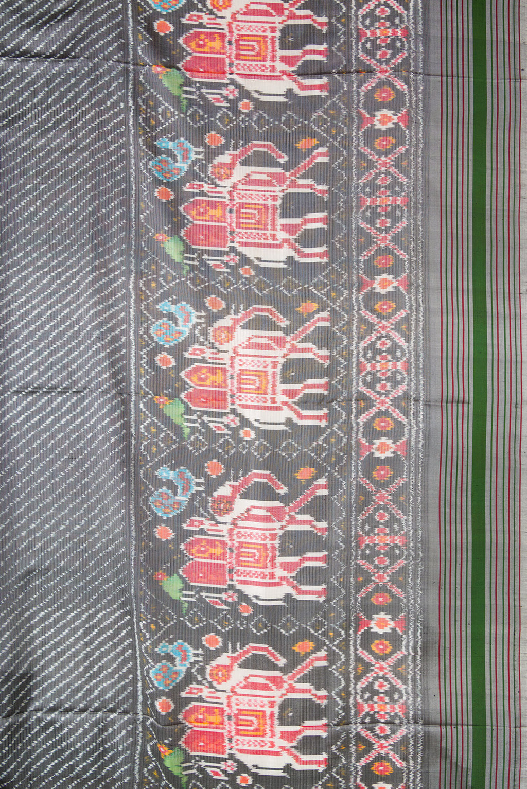 Border image of Grey Dual Tone Double Ikat Saree with Ikat Print on the body and Ikat Border. 