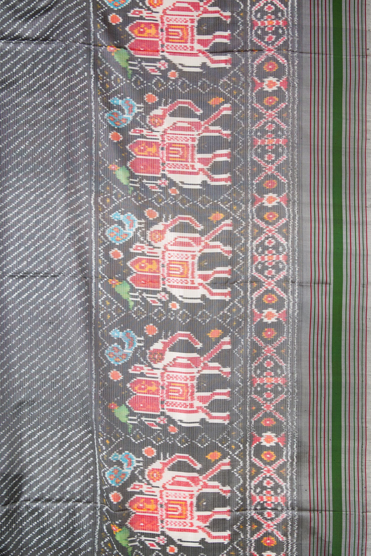 Border image of Grey Dual Tone Double Ikat Saree with Ikat Print on the body and Ikat Border. 