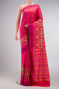 Pink Dual Tone Double Ikat Saree with Ikat Print on the body and Ikat Border.  displayed on a mannequin