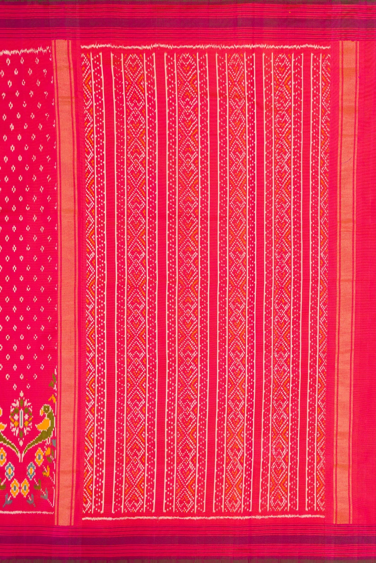 Close up image of the pallu of Pink Dual Tone Double Ikat Saree with Ikat Print on the body and Ikat Border. 