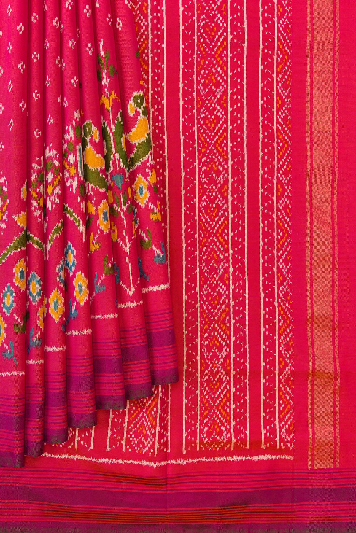 Pleats and pallu of Pink Dual Tone Double Ikat Saree with Ikat Print on the body and Ikat Border. 