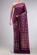 Purple Dual Tone Double Ikat Saree with Ikat Print on the body and Zari Border.  displayed on a mannequin