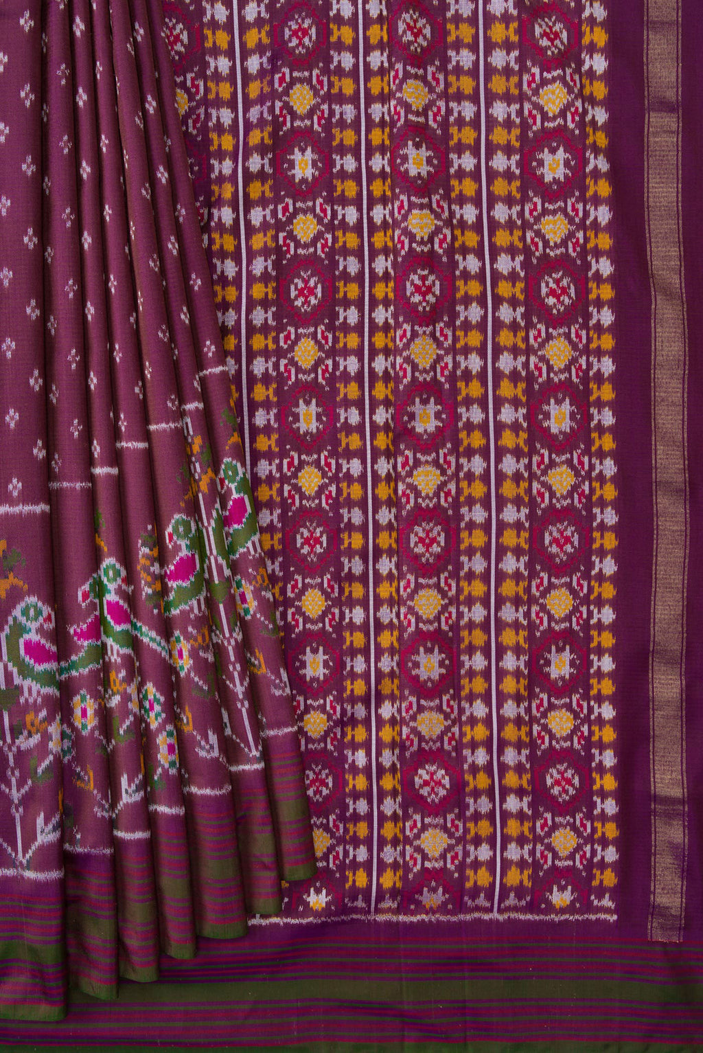 Pleats and pallu of Purple Dual Tone Double Ikat Saree with Ikat Print on the body and Zari Border. 