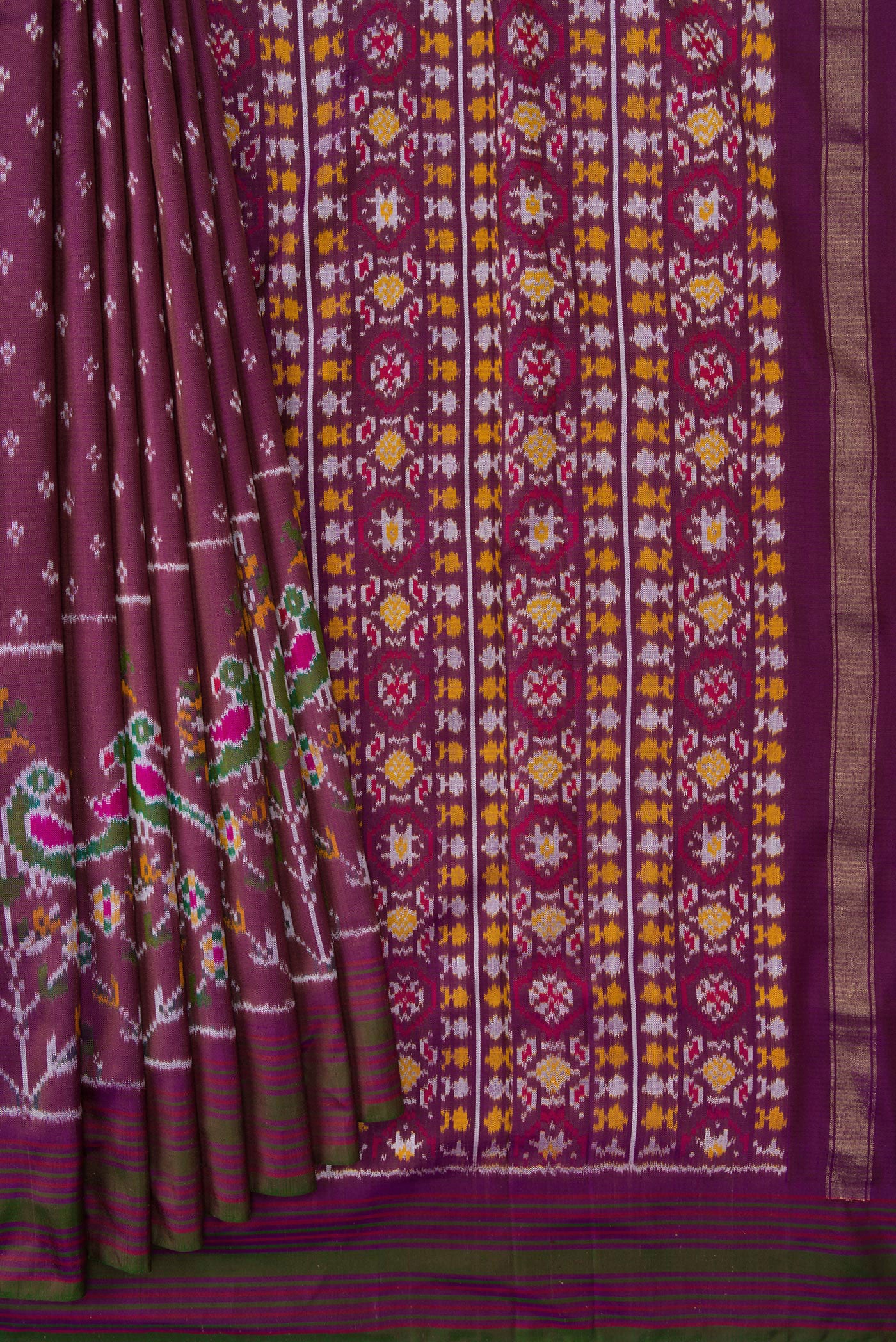 Pleats and pallu of Purple Dual Tone Double Ikat Saree with Ikat Print on the body and Zari Border. 