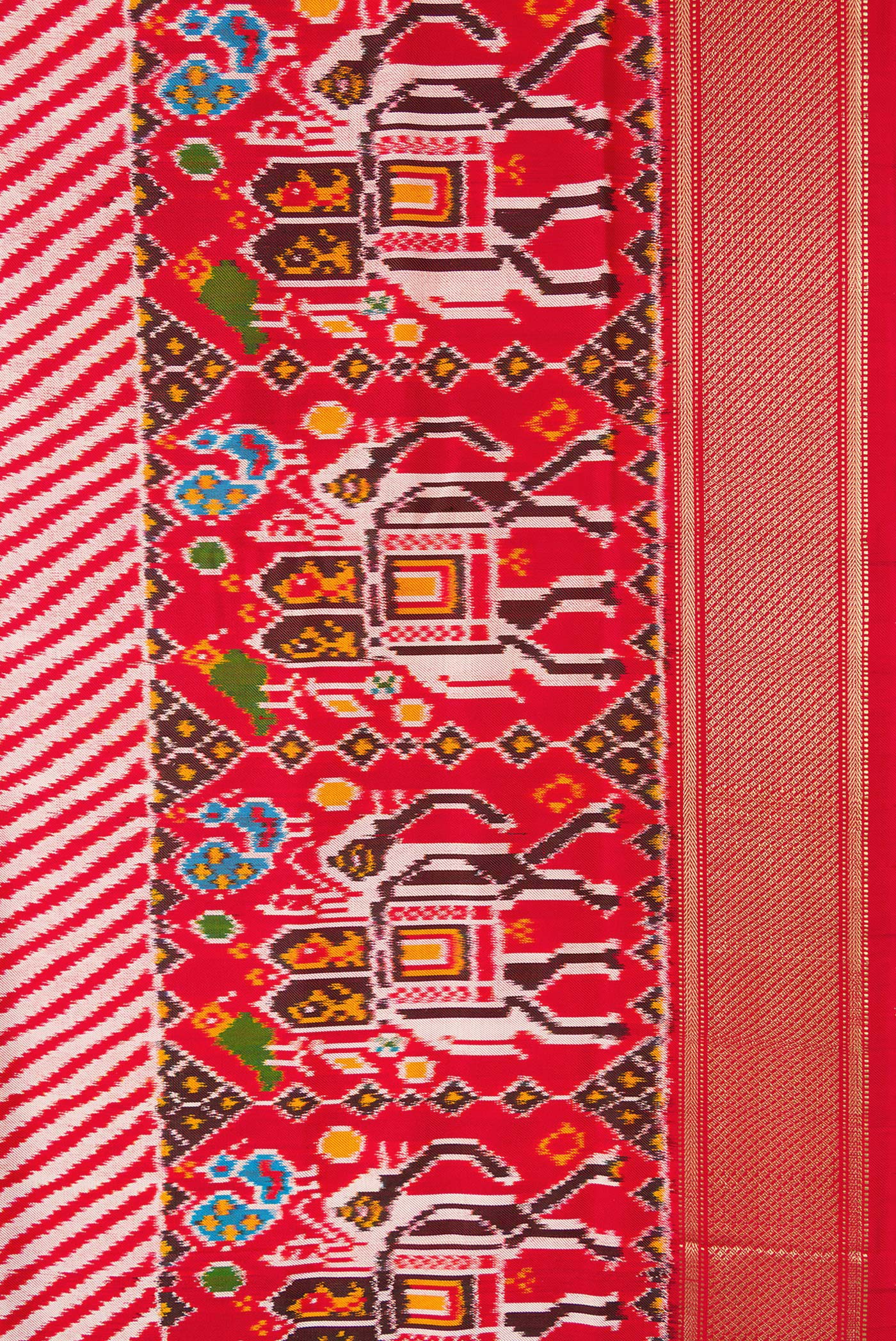Border image of Red Dual Tone Double Ikat Saree with Ikat Print on the body and Zari Border. 