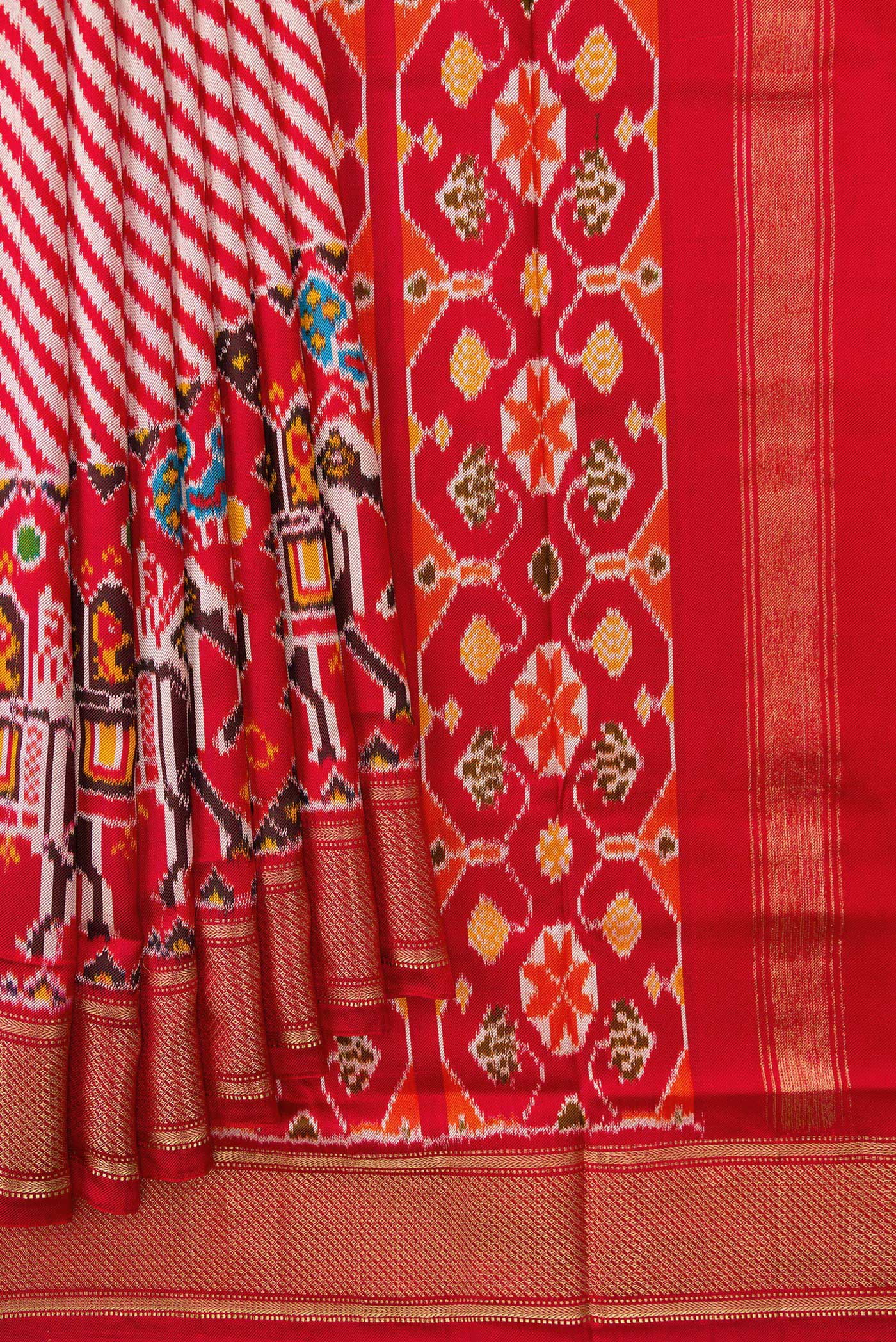 Pleats and pallu of Red Dual Tone Double Ikat Saree with Ikat Print on the body and Zari Border. 