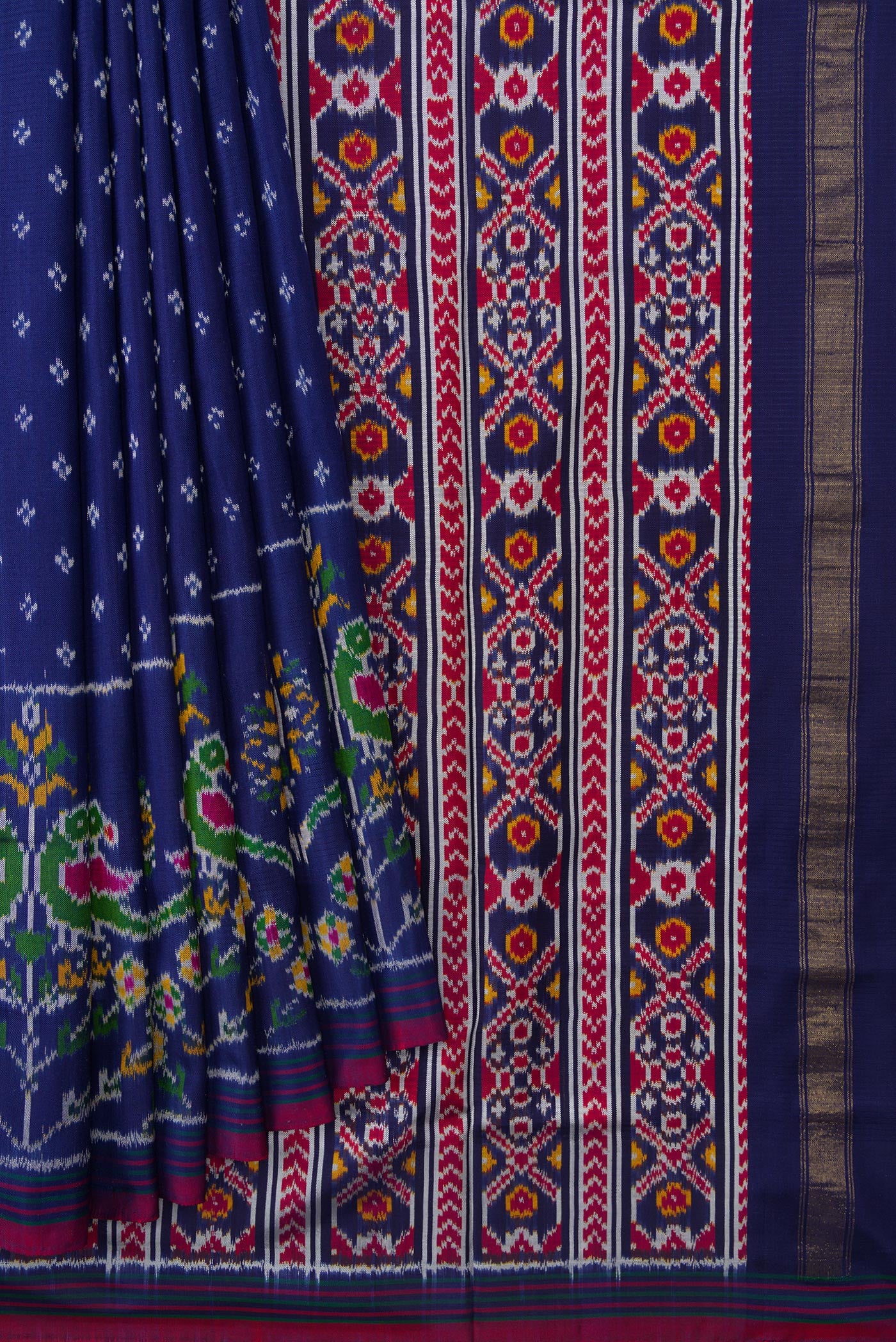 Pleats and pallu of Navy Blue Dual Tone Double Ikat Saree with Ikat Print on the body and Ikat Border. 