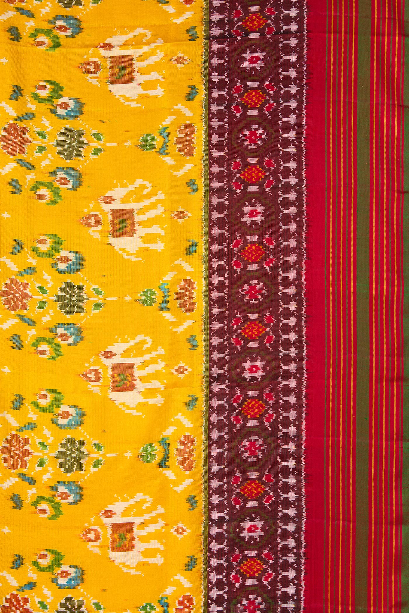 Border image of Mustard Dual Tone Double Ikat Saree with Ikat Print on the body and Ikat Border. 