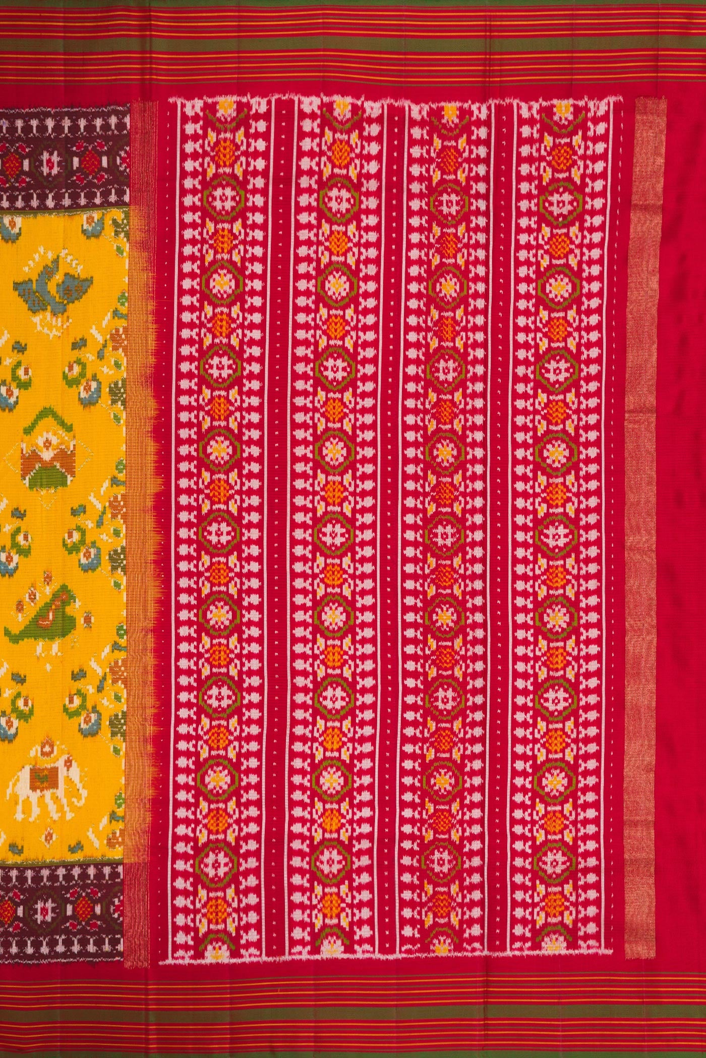 Close up image of the pallu of Mustard Dual Tone Double Ikat Saree with Ikat Print on the body and Ikat Border. 
