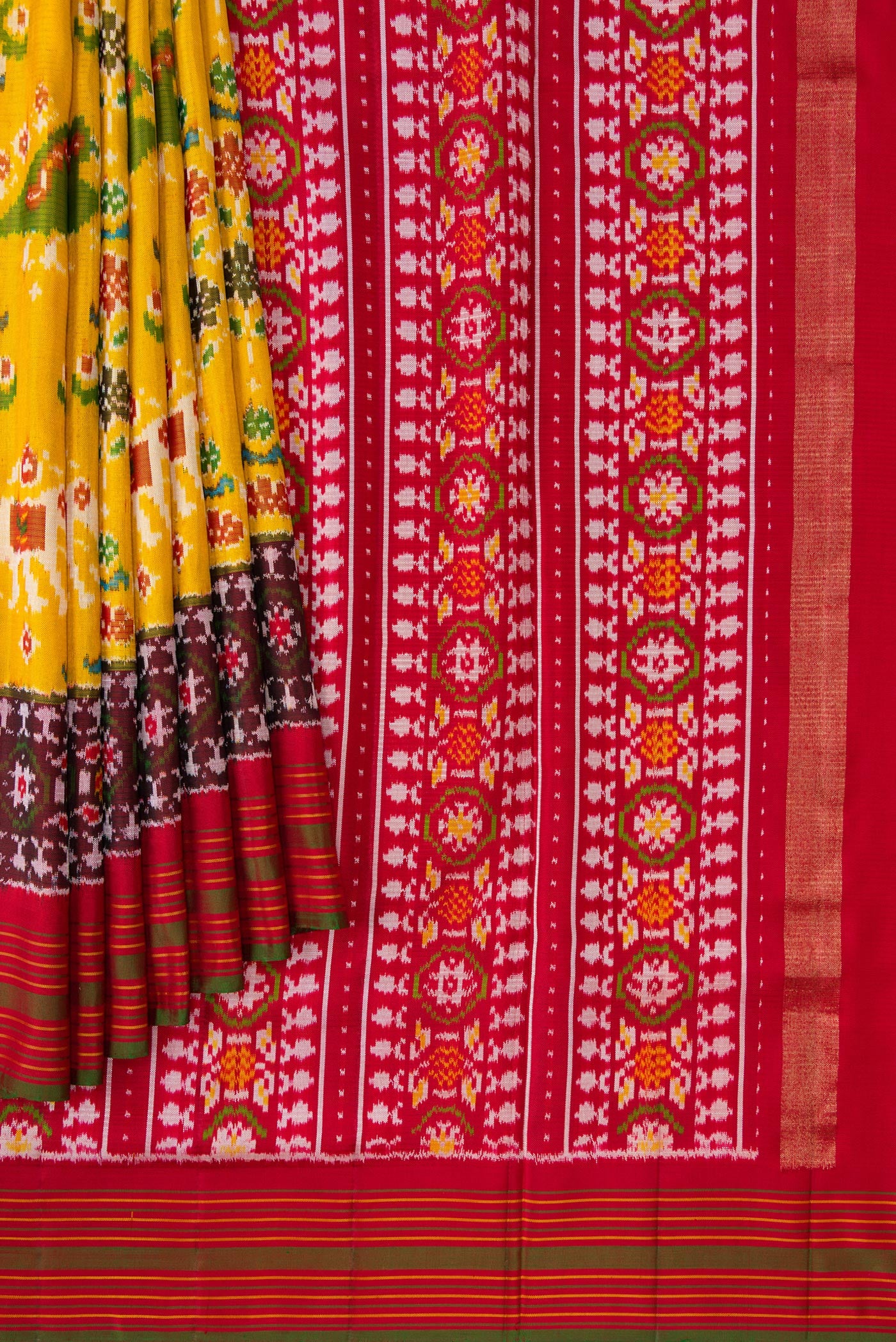 Pleats and pallu of Mustard Dual Tone Double Ikat Saree with Ikat Print on the body and Ikat Border. 