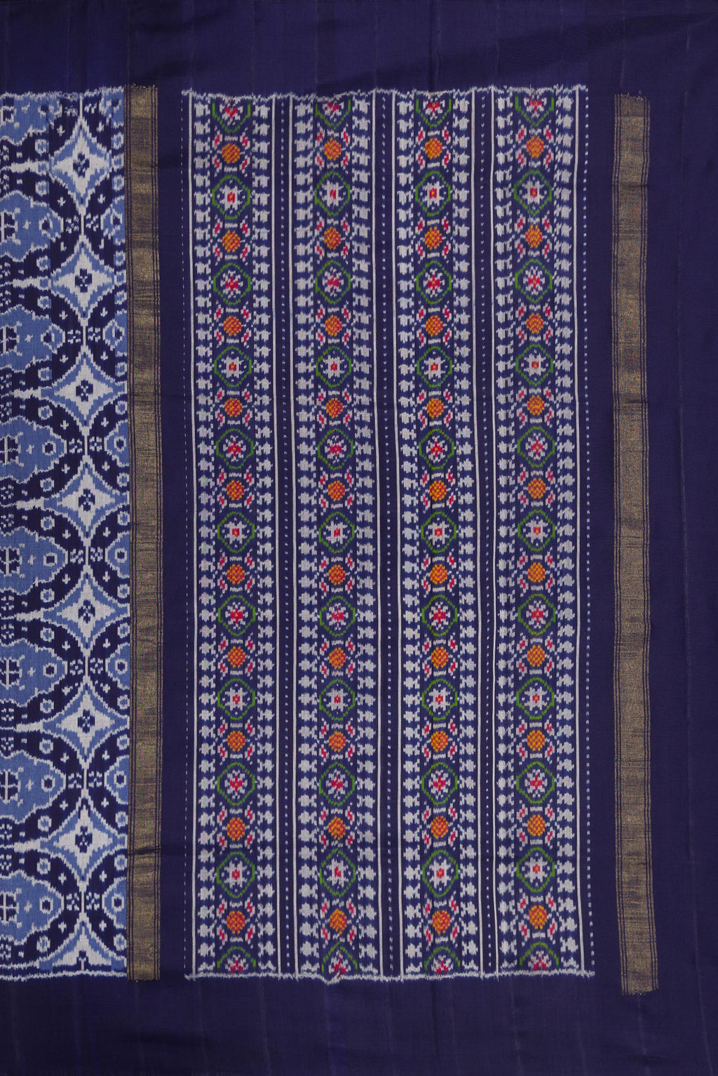 Close up image of the pallu of Navy Blue Dual Tone Double Ikat Saree with Ikat Print on the body and Plain Border. 