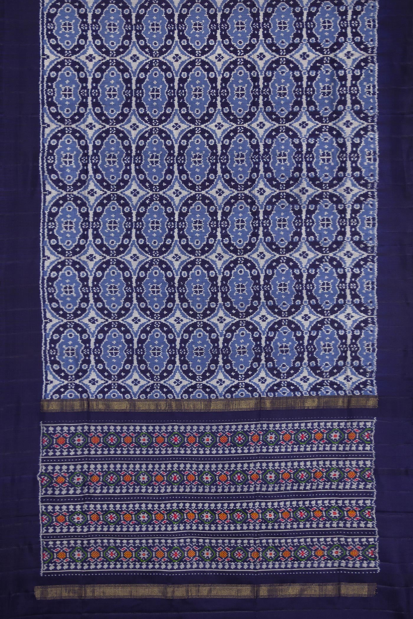 Flat view of Navy Blue Dual Tone Double Ikat Saree with Ikat Print on the body and Plain Border. 