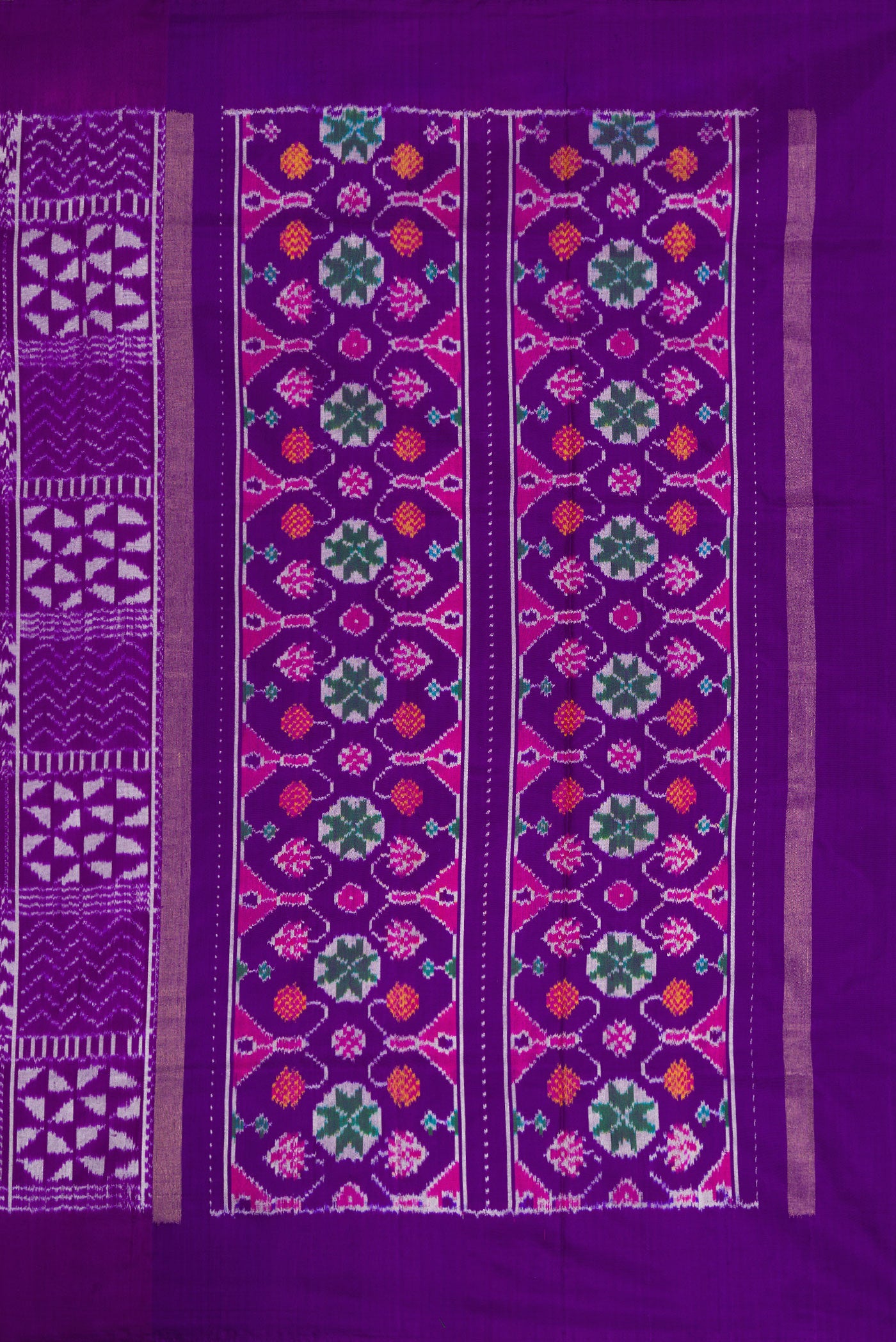 Close up image of the pallu of Violet Dual Tone Double Ikat Saree with Ikat Print on the body and Plain Border. 