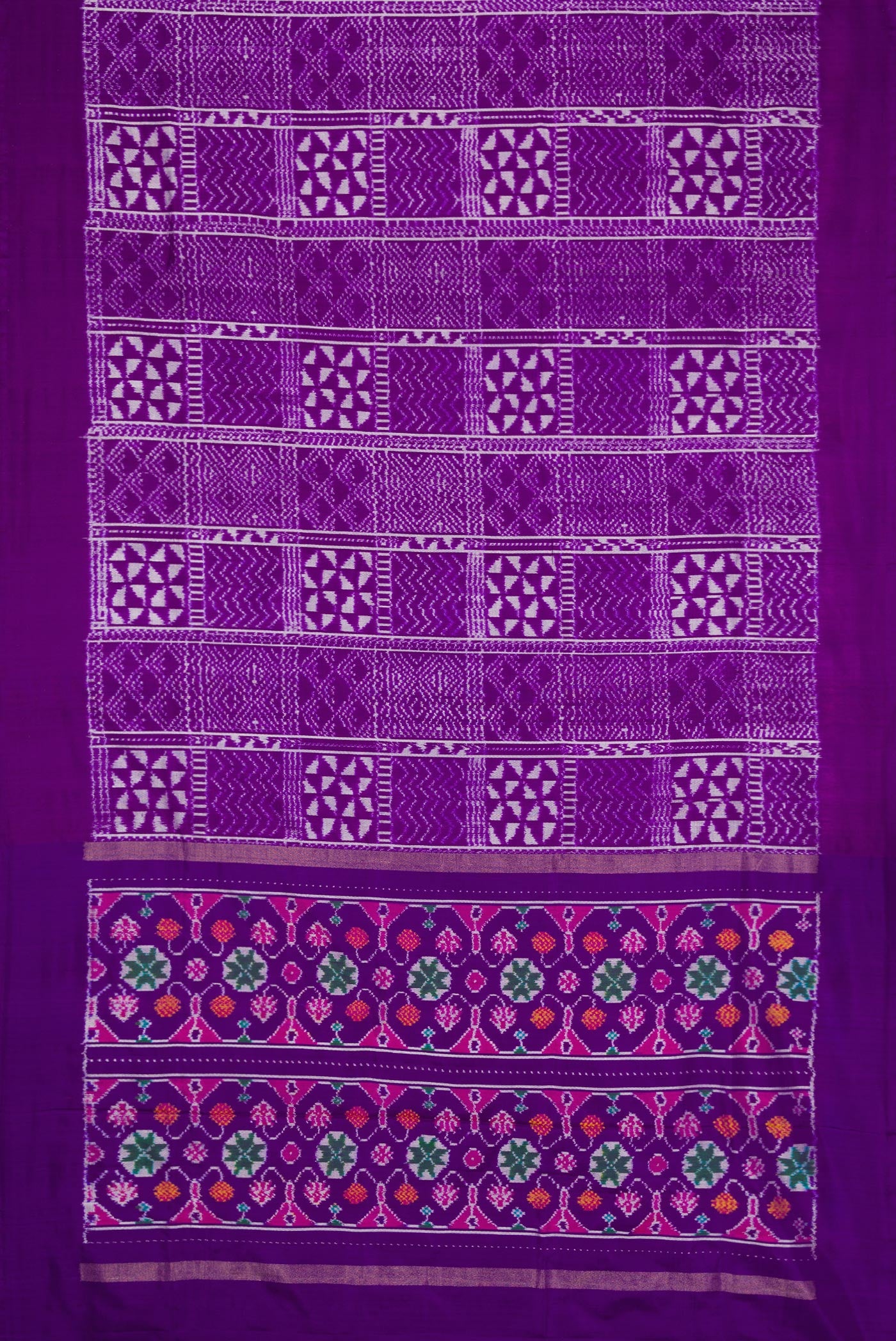 Flat view of Violet Dual Tone Double Ikat Saree with Ikat Print on the body and Plain Border. 