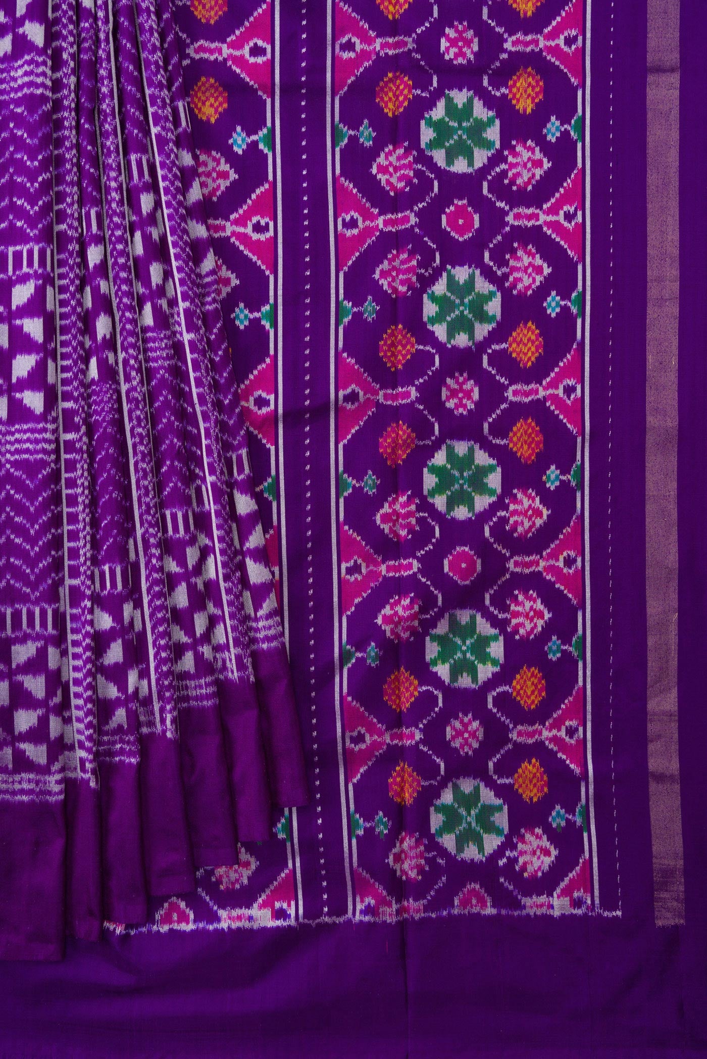 Pleats and pallu of Violet Dual Tone Double Ikat Saree with Ikat Print on the body and Plain Border. 