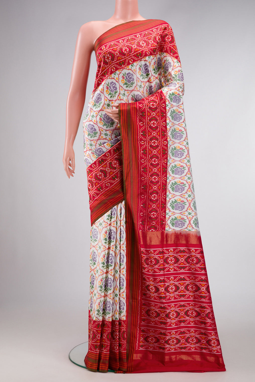 Off White Dual Tone Double Ikat Saree with Ikat Print on the body and Ikat Border.  displayed on a mannequin