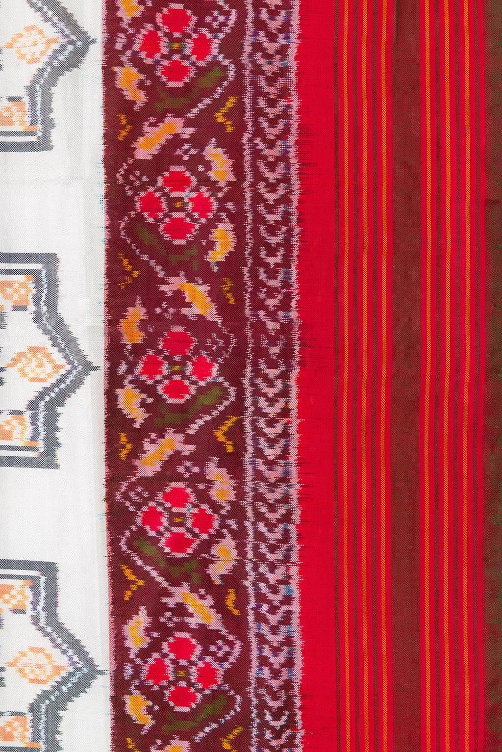 Border image of Off White Dual Tone Double Ikat Saree with Ikat Print on the body and Ikat Border. 