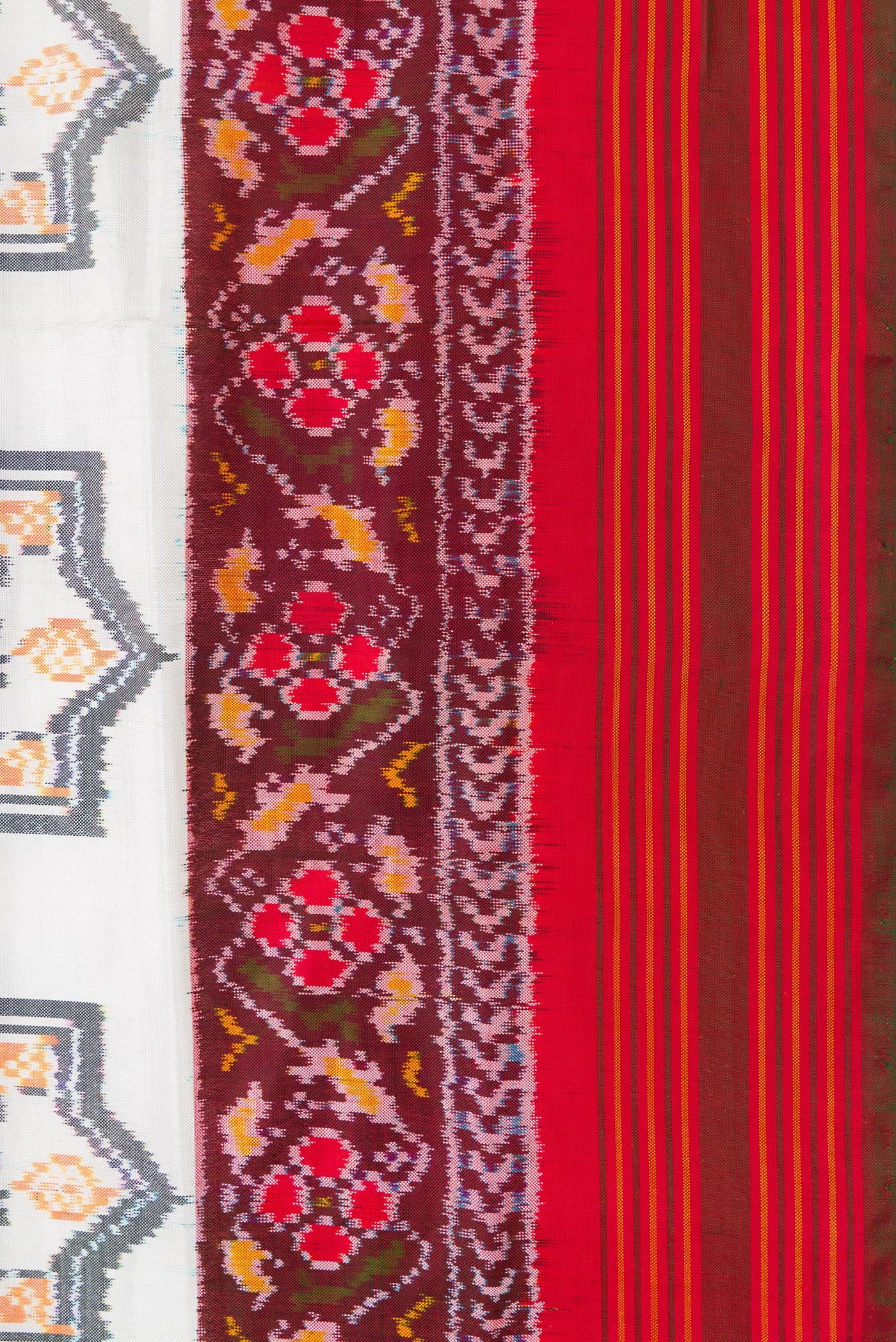 Border image of Off White Dual Tone Double Ikat Saree with Ikat Print on the body and Ikat Border. 
