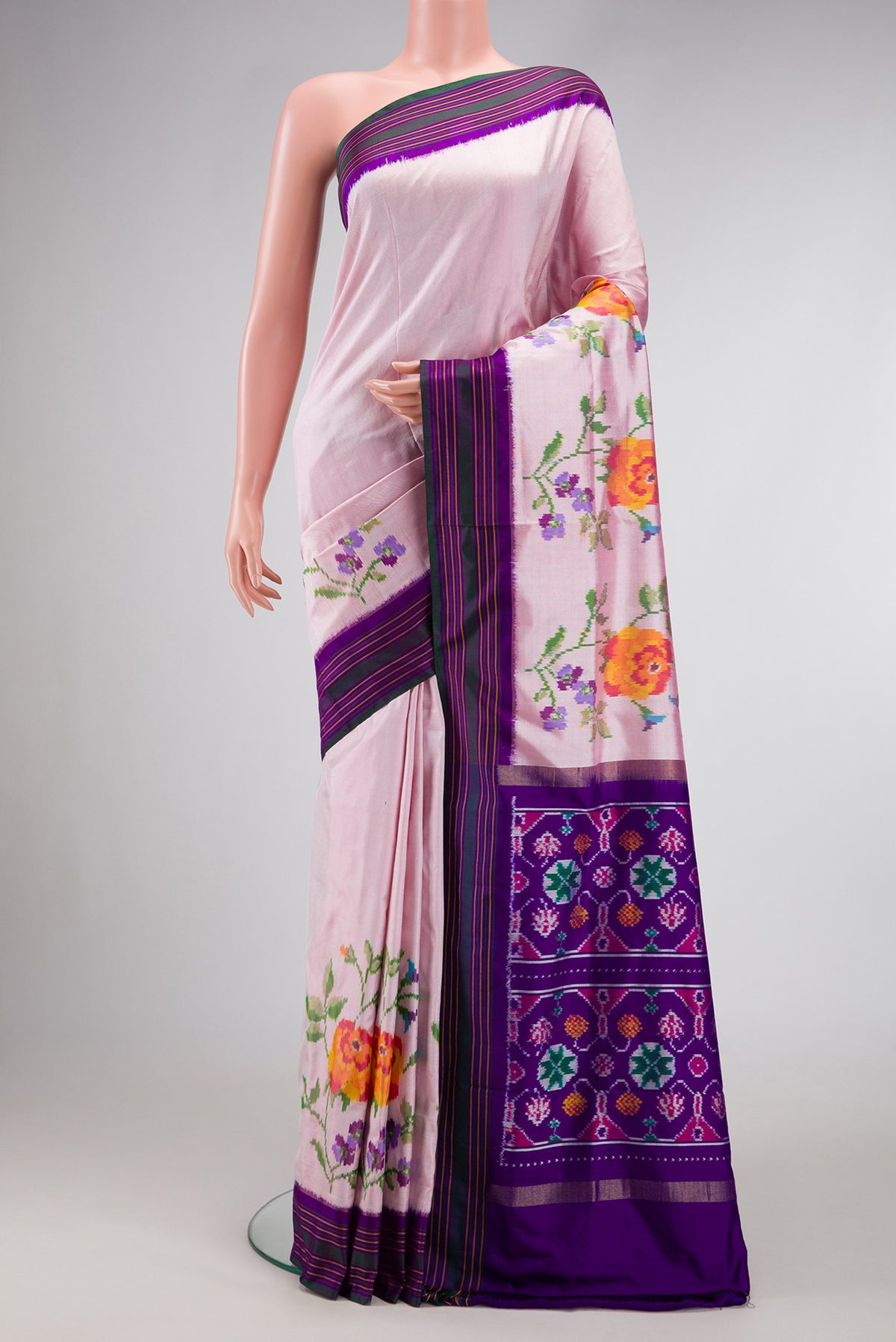 Pink Dual Tone Double Ikat Saree with Plain Body and Ikat Border.  displayed on a mannequin