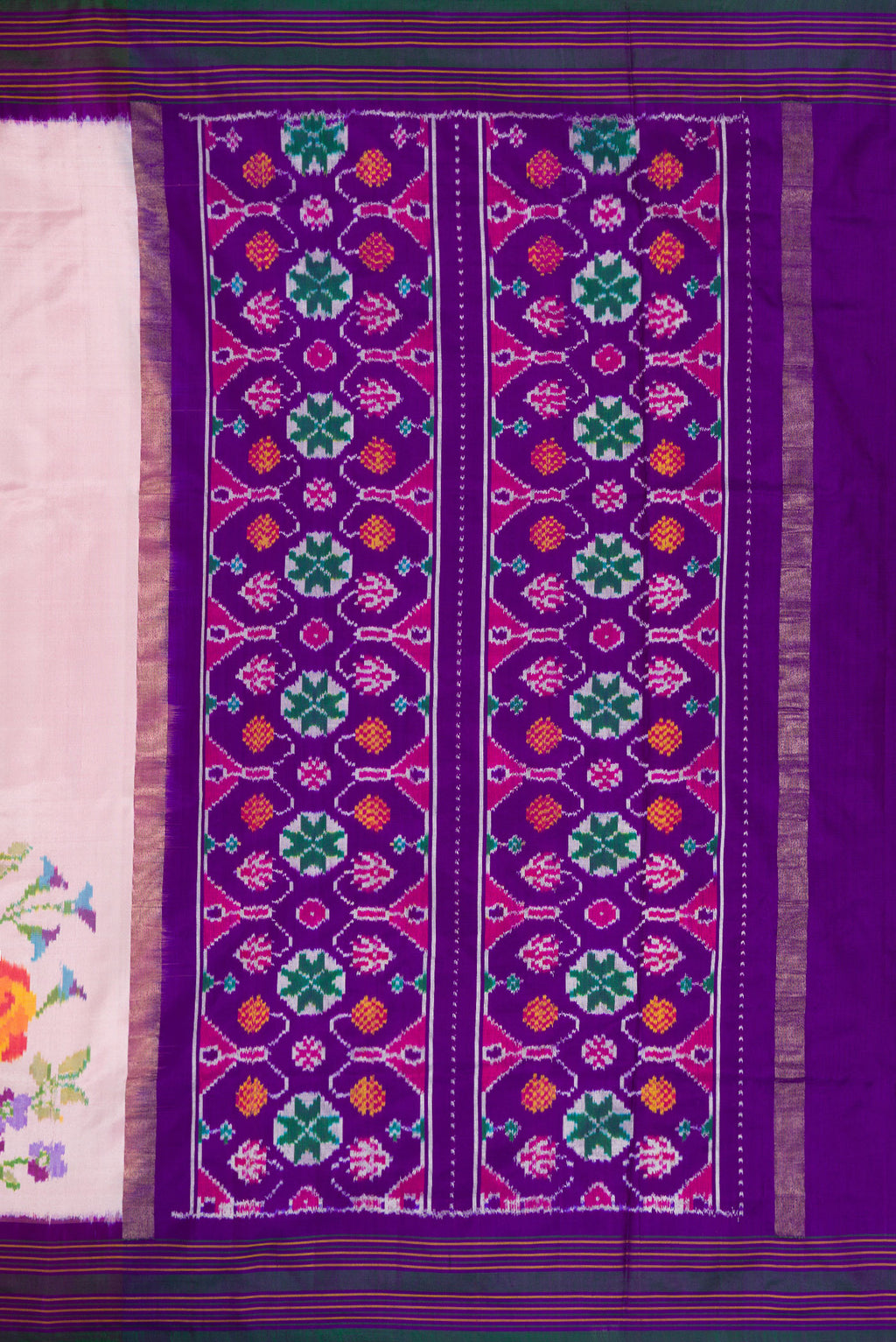 Close up image of the pallu of Pink Dual Tone Double Ikat Saree with Plain Body and Ikat Border. 