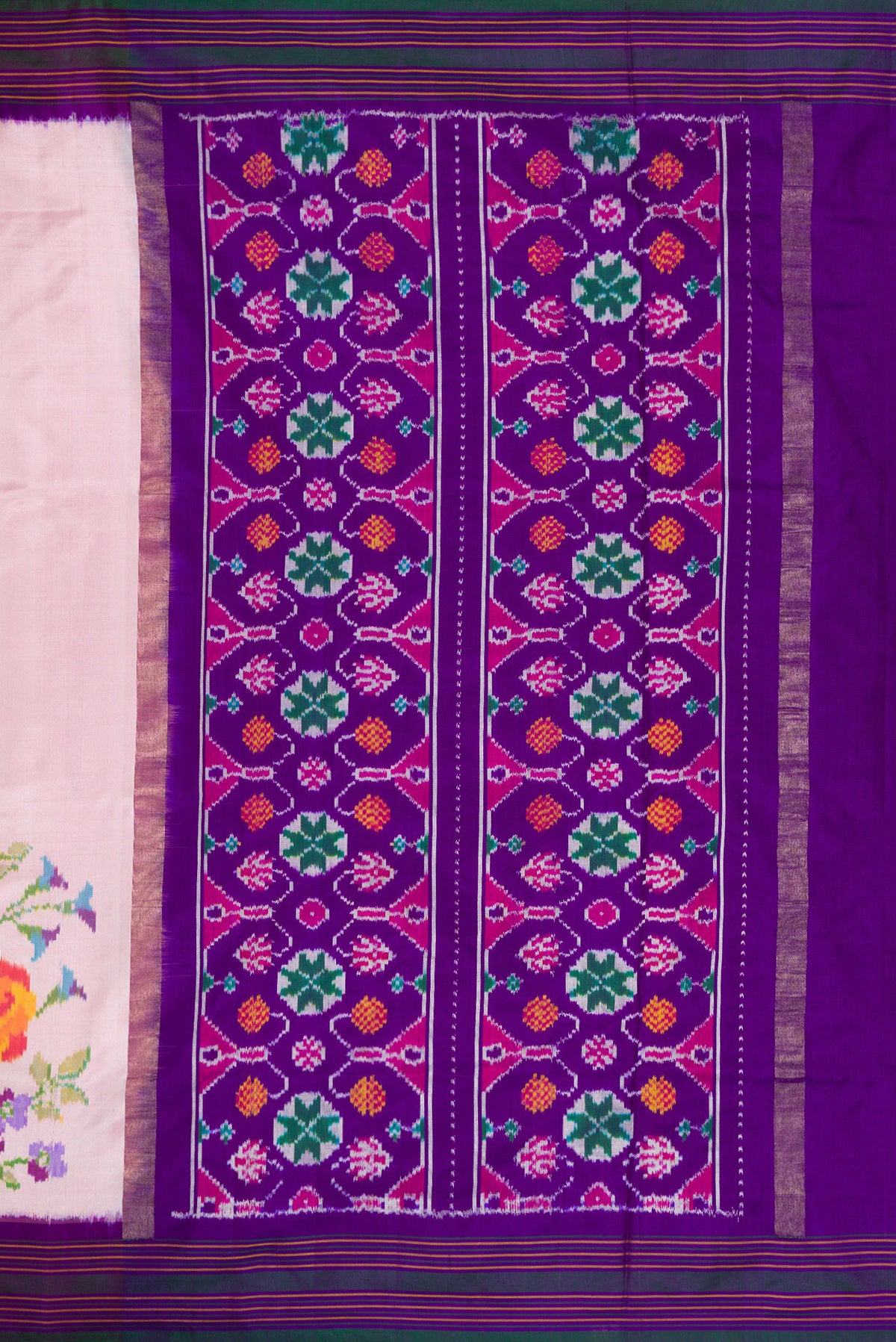 Close up image of the pallu of Pink Dual Tone Double Ikat Saree with Plain Body and Ikat Border. 