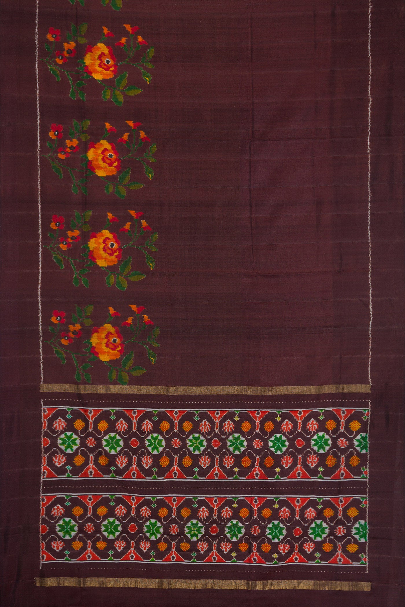 Flat view of Brown Dual Tone Double Ikat Saree with Plain Body and Ikat Border. 